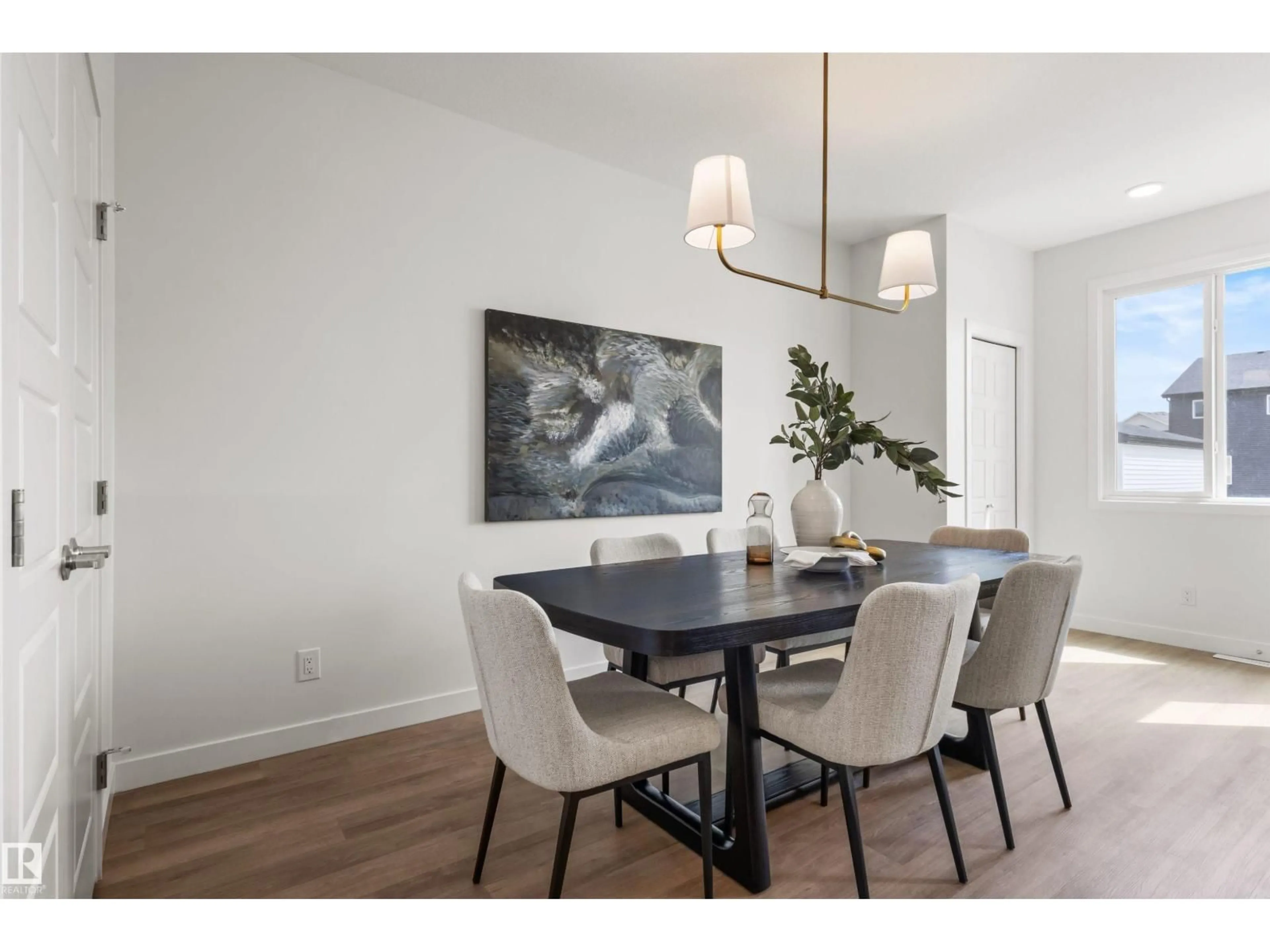 Dining room, wood/laminate floor for SW - 5749 HAWTHORN CM, Edmonton Alberta T6X3K8