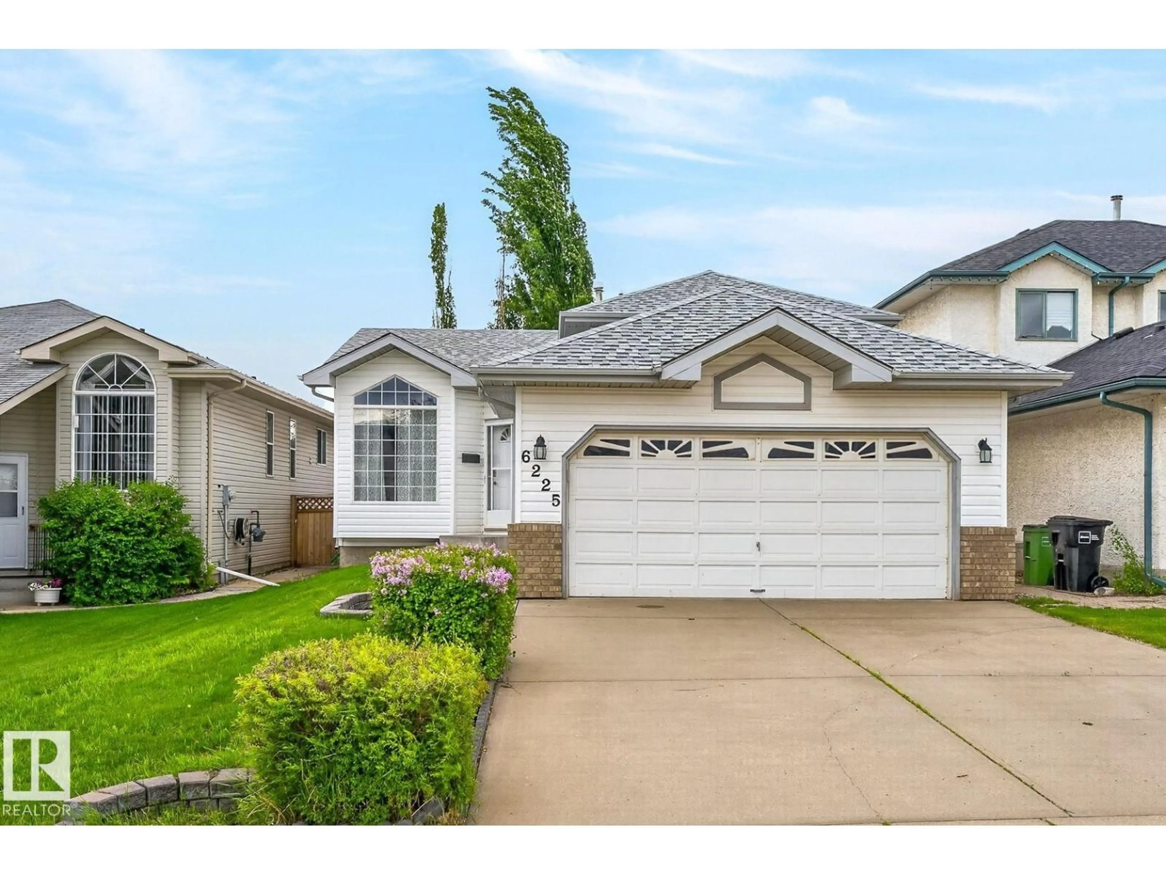 Home with vinyl exterior material, street for 6225 159A AV, Edmonton Alberta T5Y2R9
