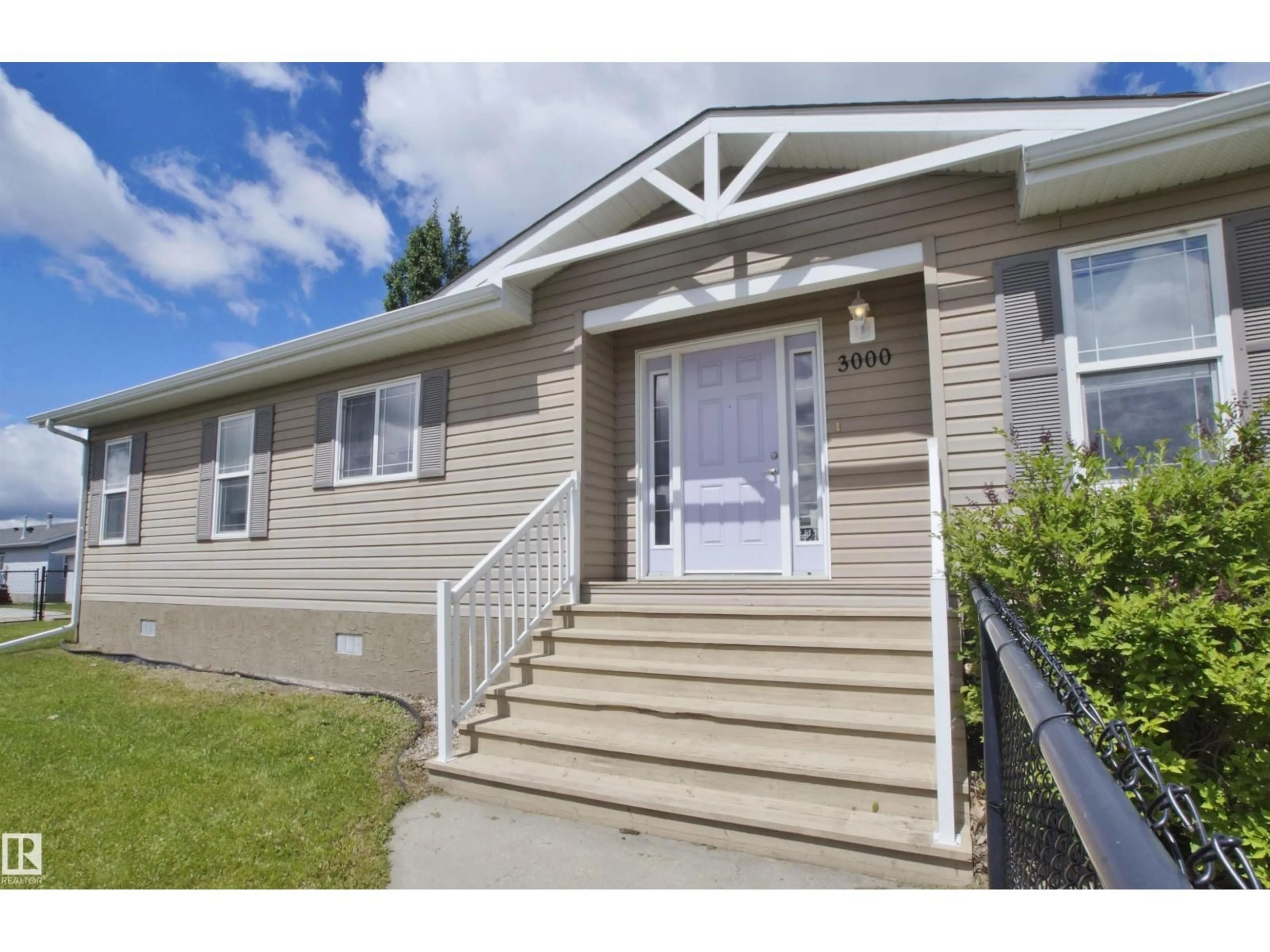 Home with vinyl exterior material, street for 3000 ASPEN WD, Leduc Alberta T9E8R5
