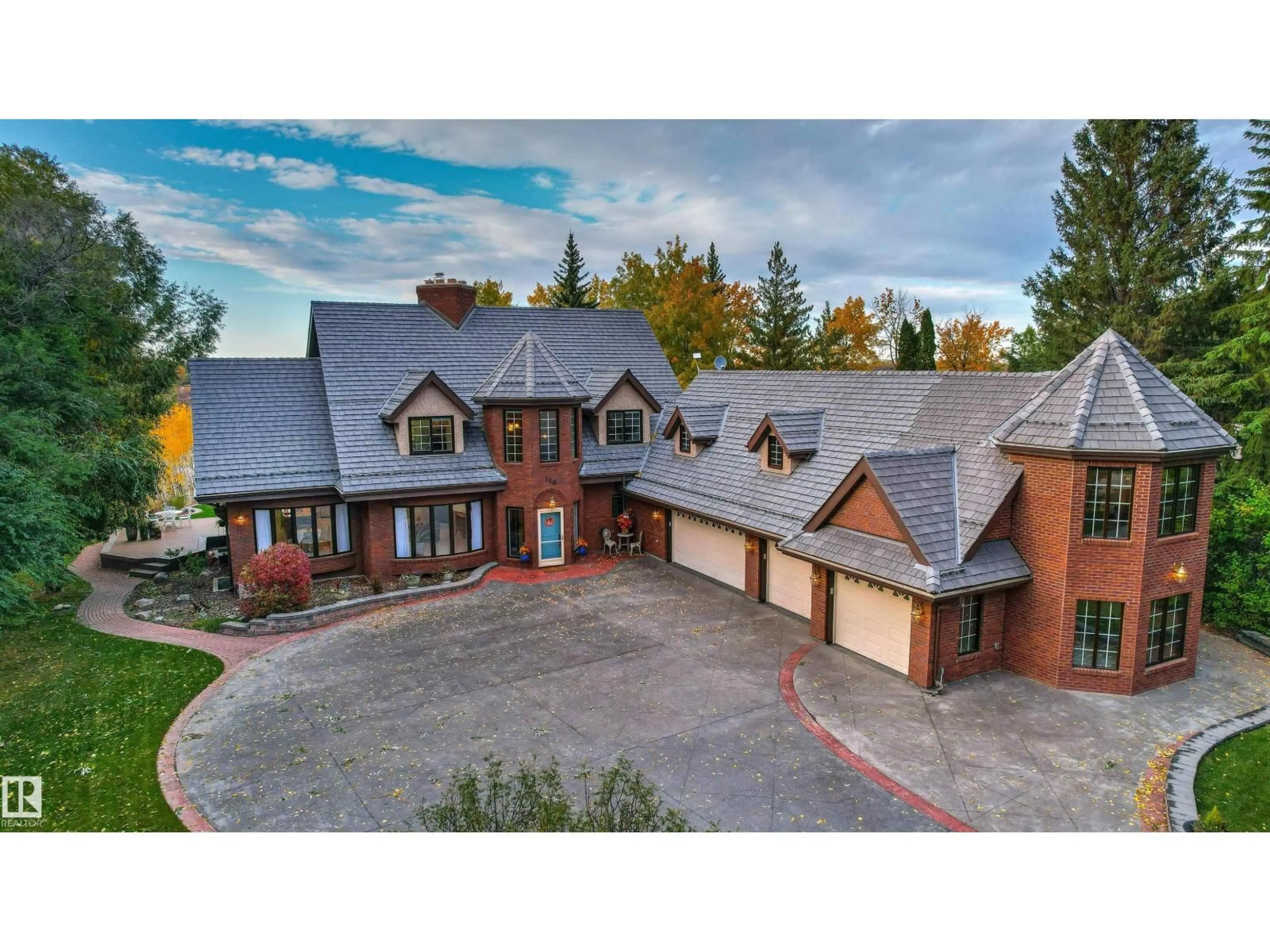 A pic from outside/outdoor area/front of a property/back of a property/a pic from drone, mountain view for 116 WINDERMERE DR, Edmonton Alberta T6W0S5