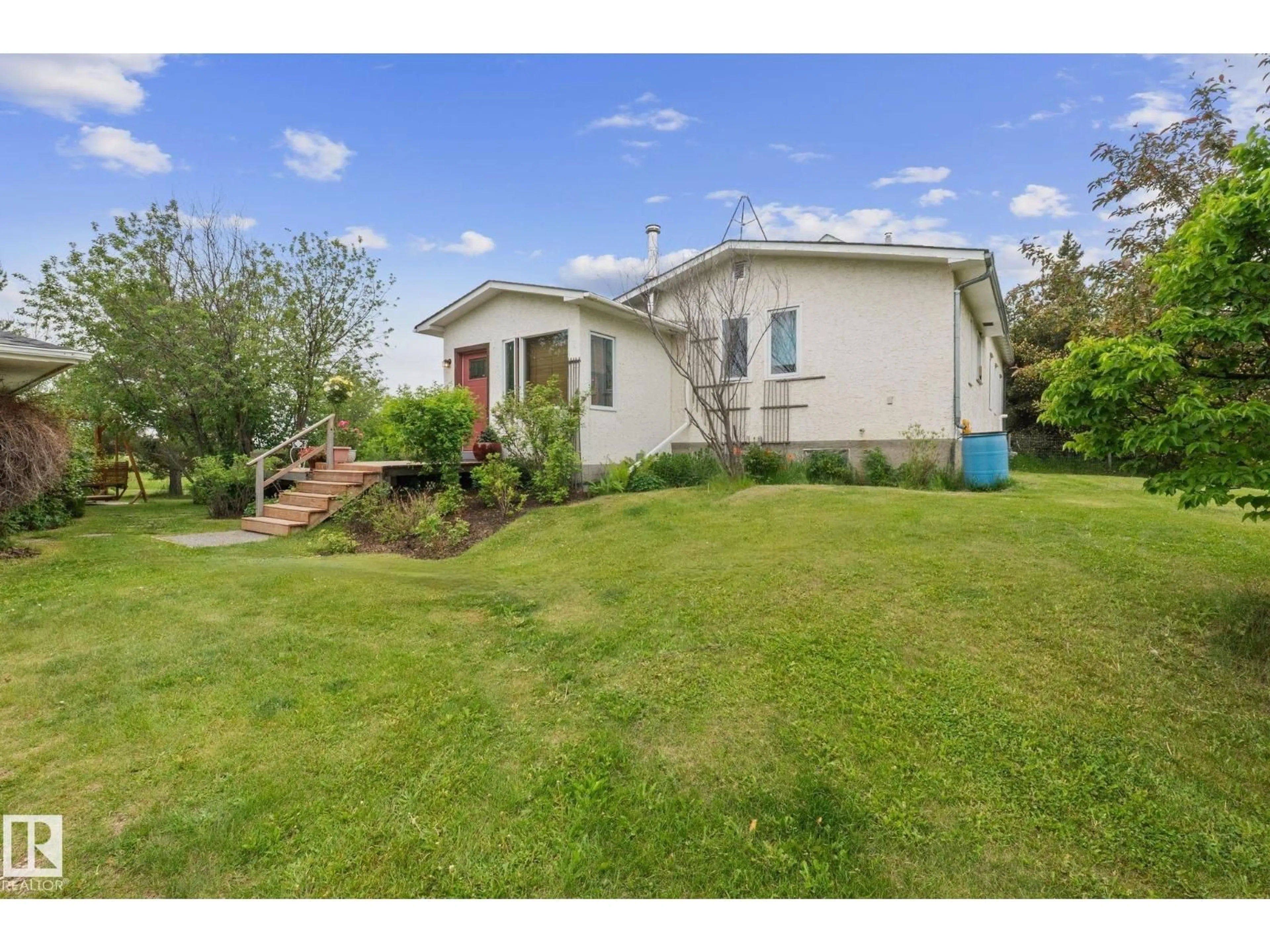 A pic from outside/outdoor area/front of a property/back of a property/a pic from drone, street for 23351 TWP RD 502, Rural Leduc County Alberta T4X0R4