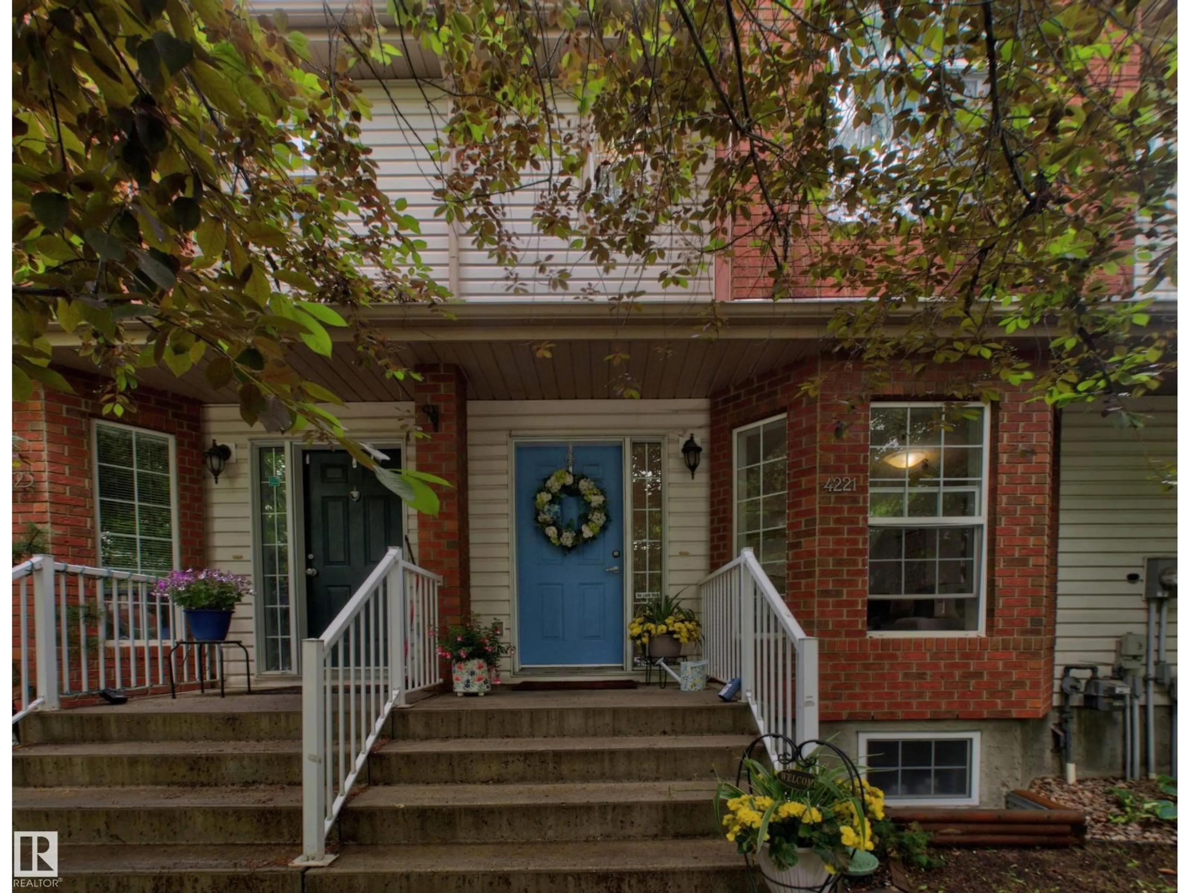 Home with brick exterior material, street for NW NW - 4221 TERWILLEGAR VISTA VS, Edmonton Alberta T6R3J3