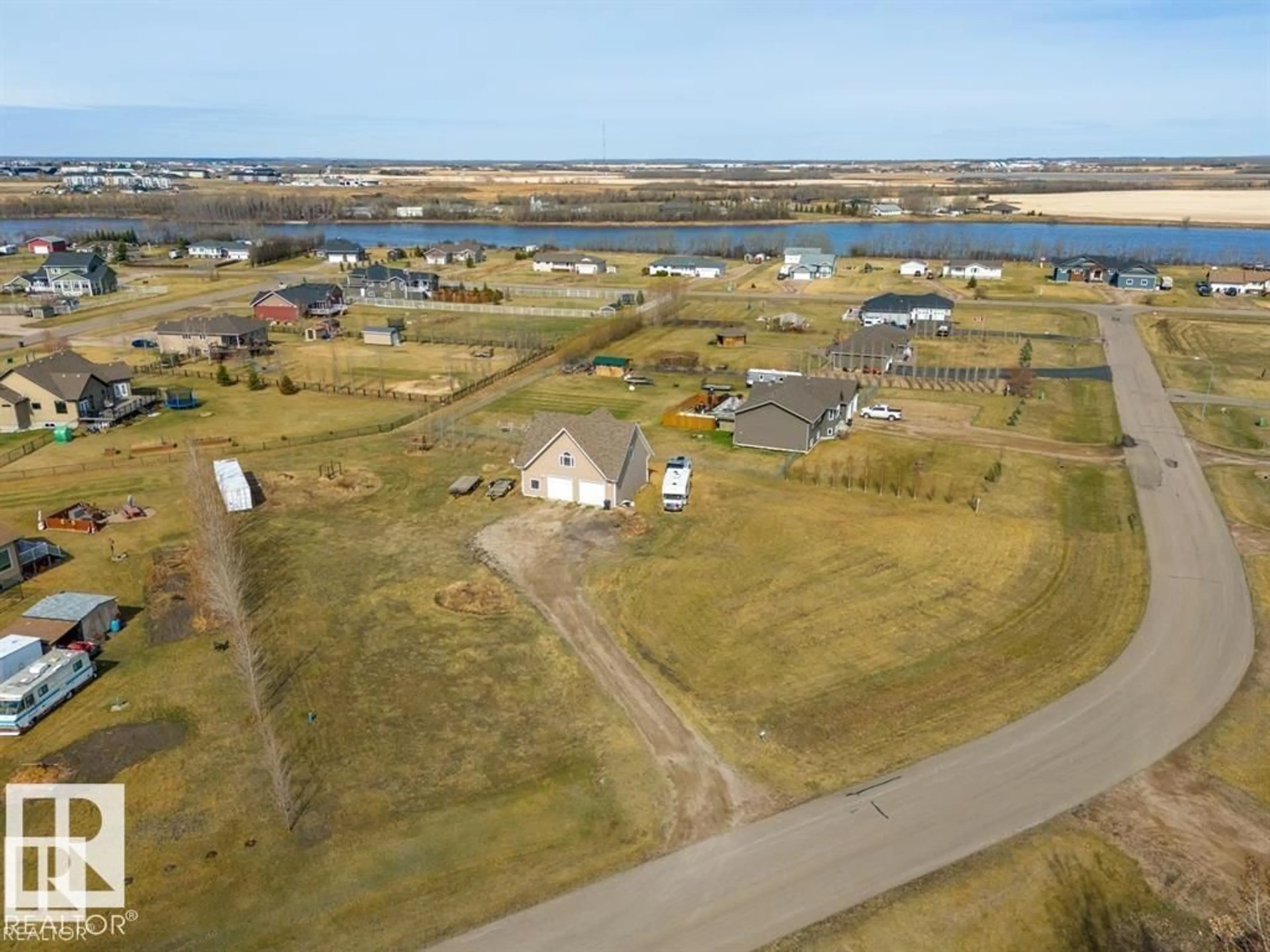 A pic from outside/outdoor area/front of a property/back of a property/a pic from drone, water/lake/river/ocean view for 124 45326 HIGHWAY HIGHWAY, Rural Bonnyville M.D. Alberta T9N2J6