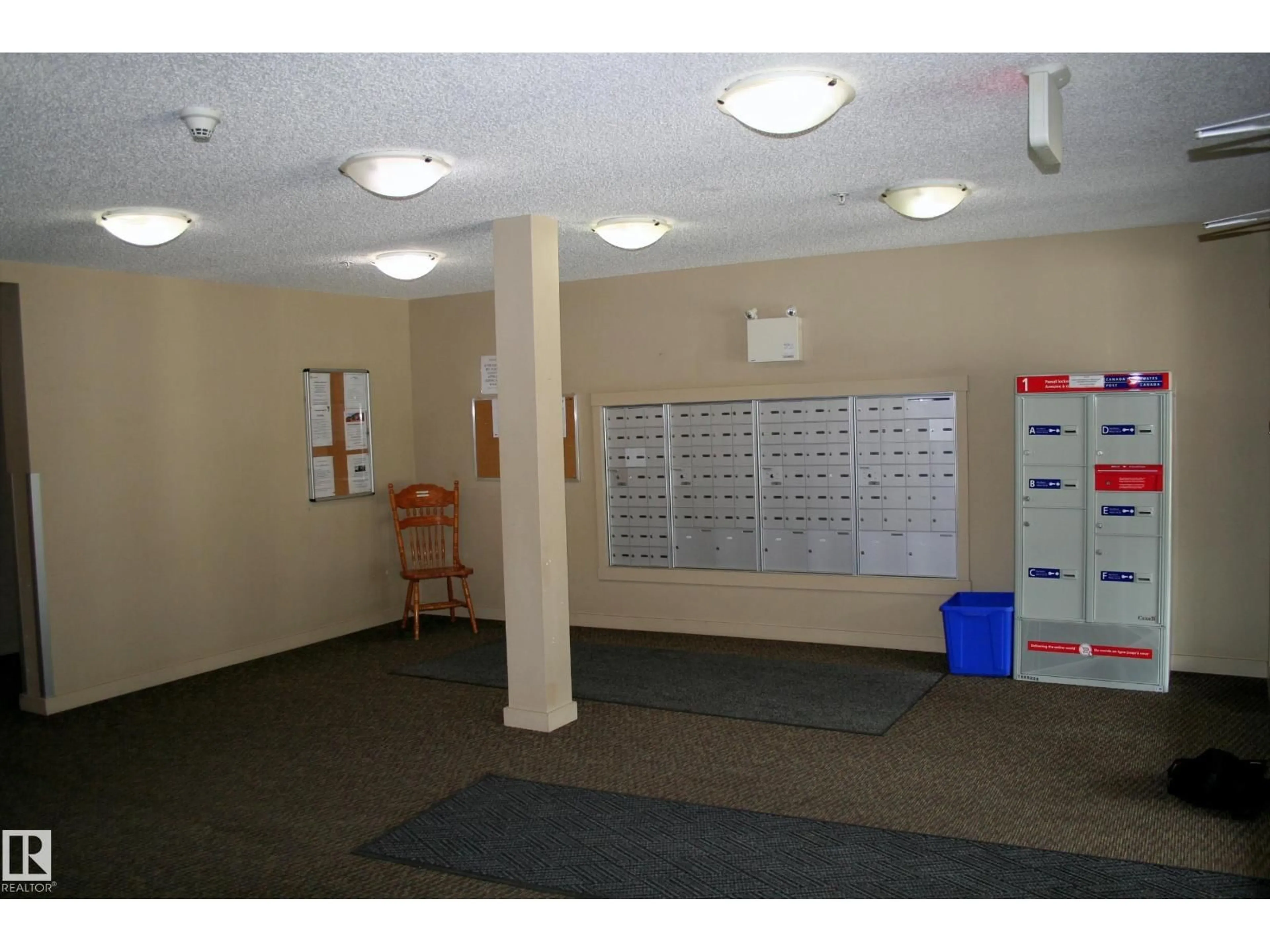 Indoor foyer for #417 - 5804 MULLEN PL, Edmonton Alberta T6R0W3