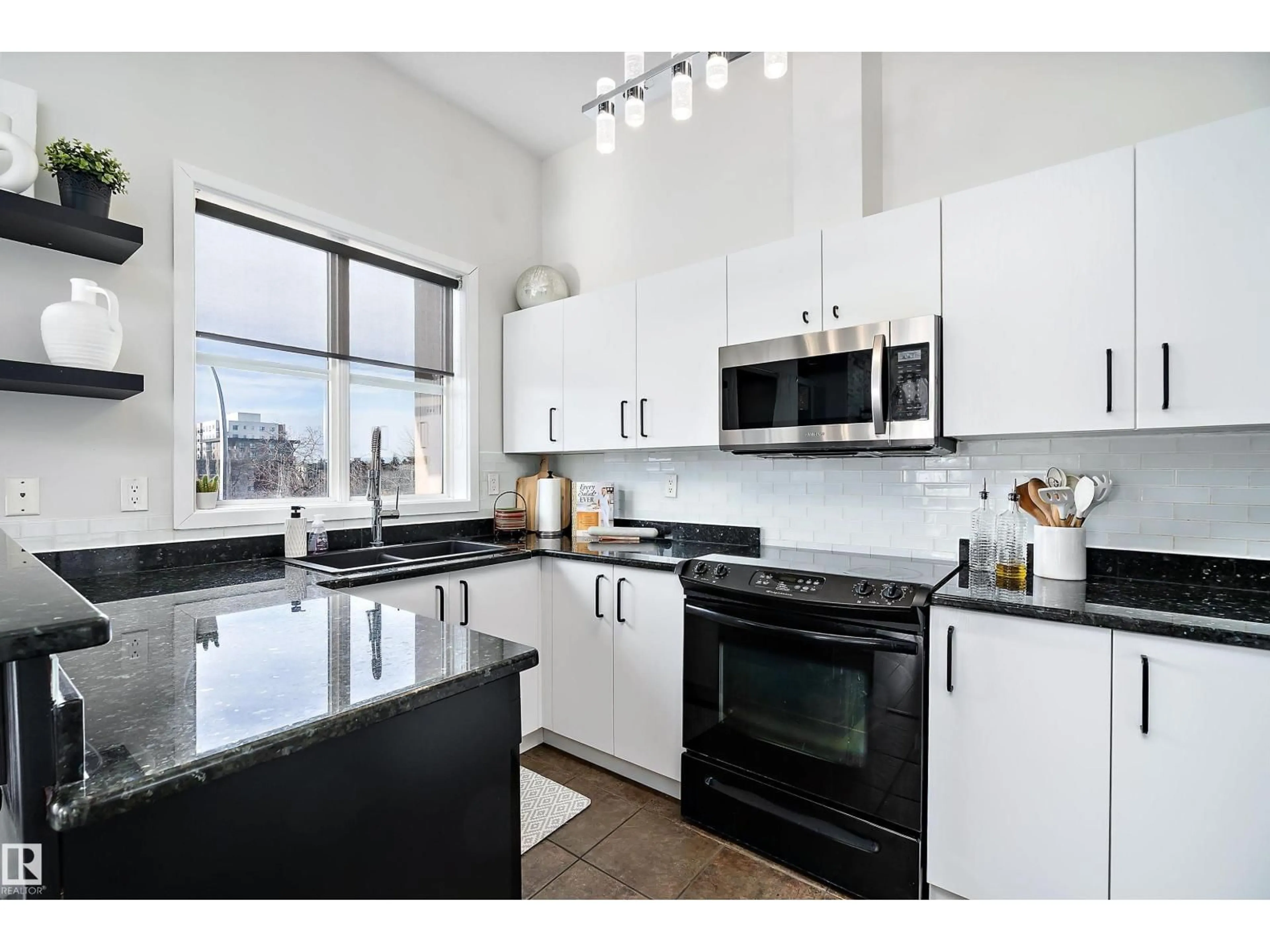 Open concept kitchen, ceramic/tile floor for NW - 10905 109 ST, Edmonton Alberta T5H3C2