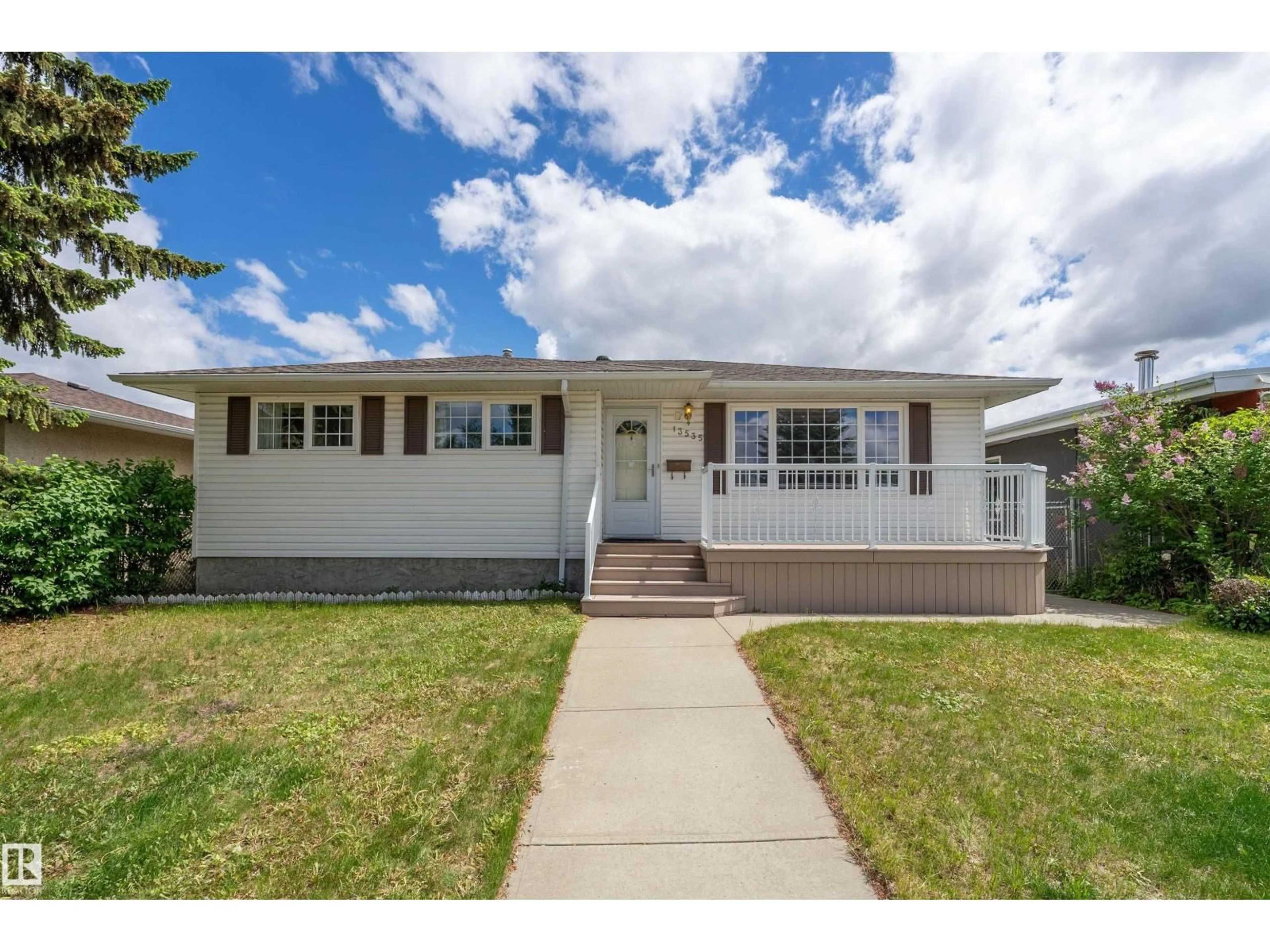 Home with vinyl exterior material, street for 13535 67 ST, Edmonton Alberta T5C0C6