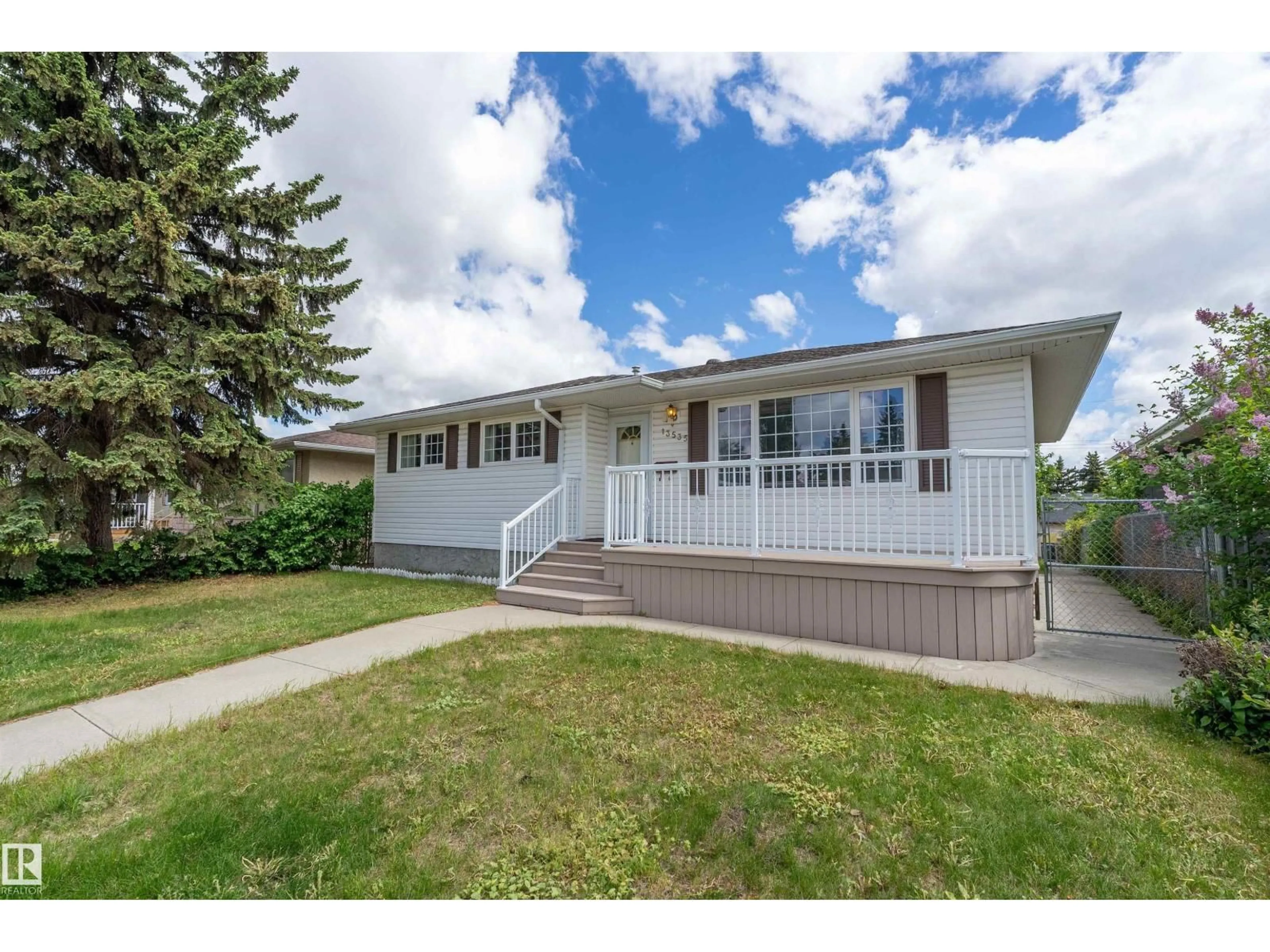 Home with vinyl exterior material, street for 13535 67 ST, Edmonton Alberta T5C0C6