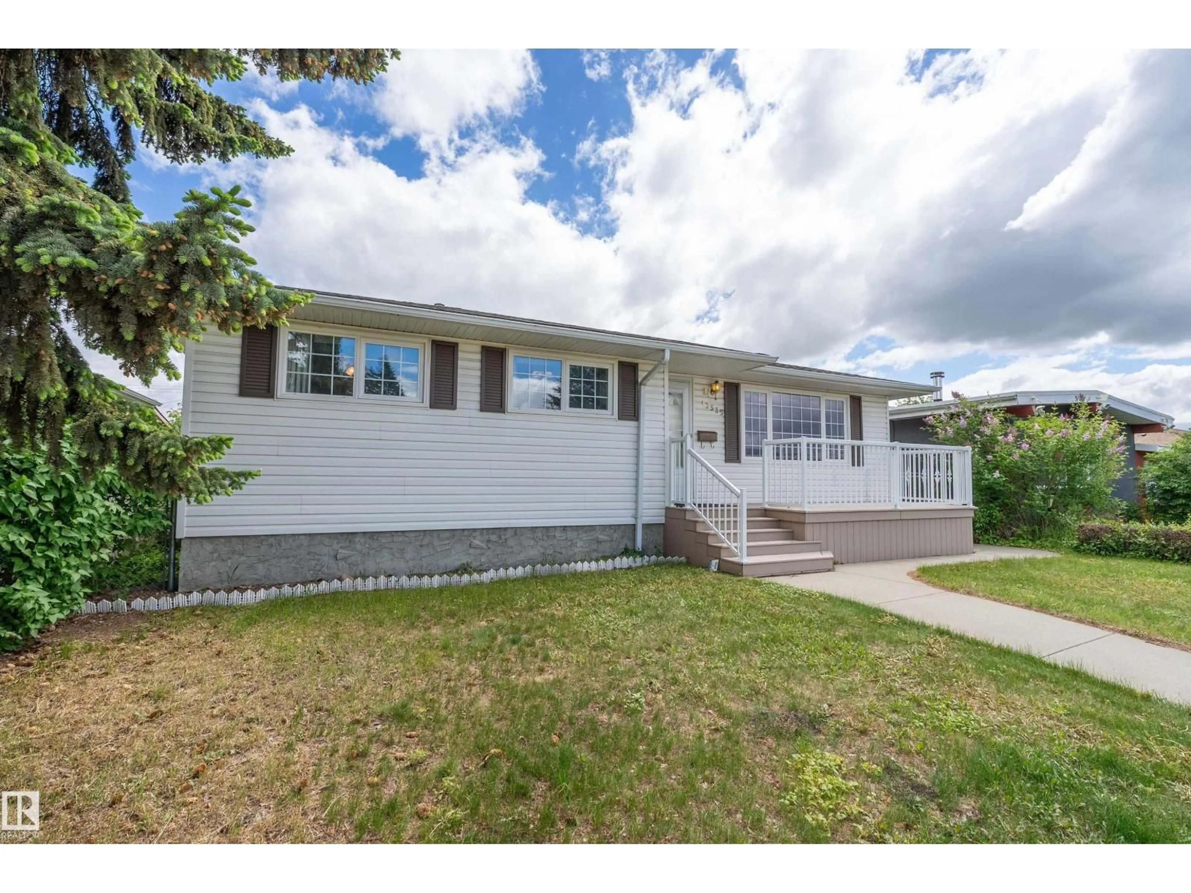 Home with vinyl exterior material, street for 13535 67 ST, Edmonton Alberta T5C0C6