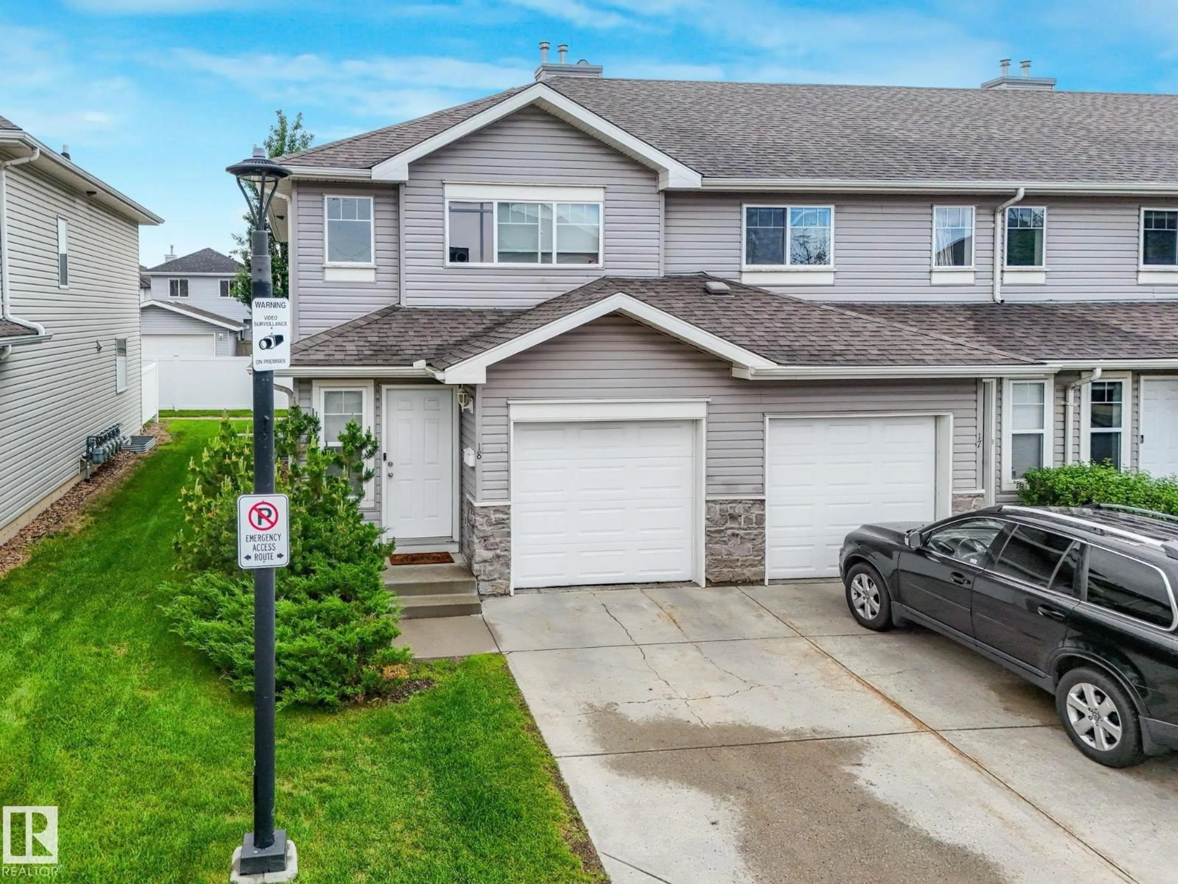 Home with vinyl exterior material, street for #18 - 230 EDWARDS DR, Edmonton Alberta T6X1G7