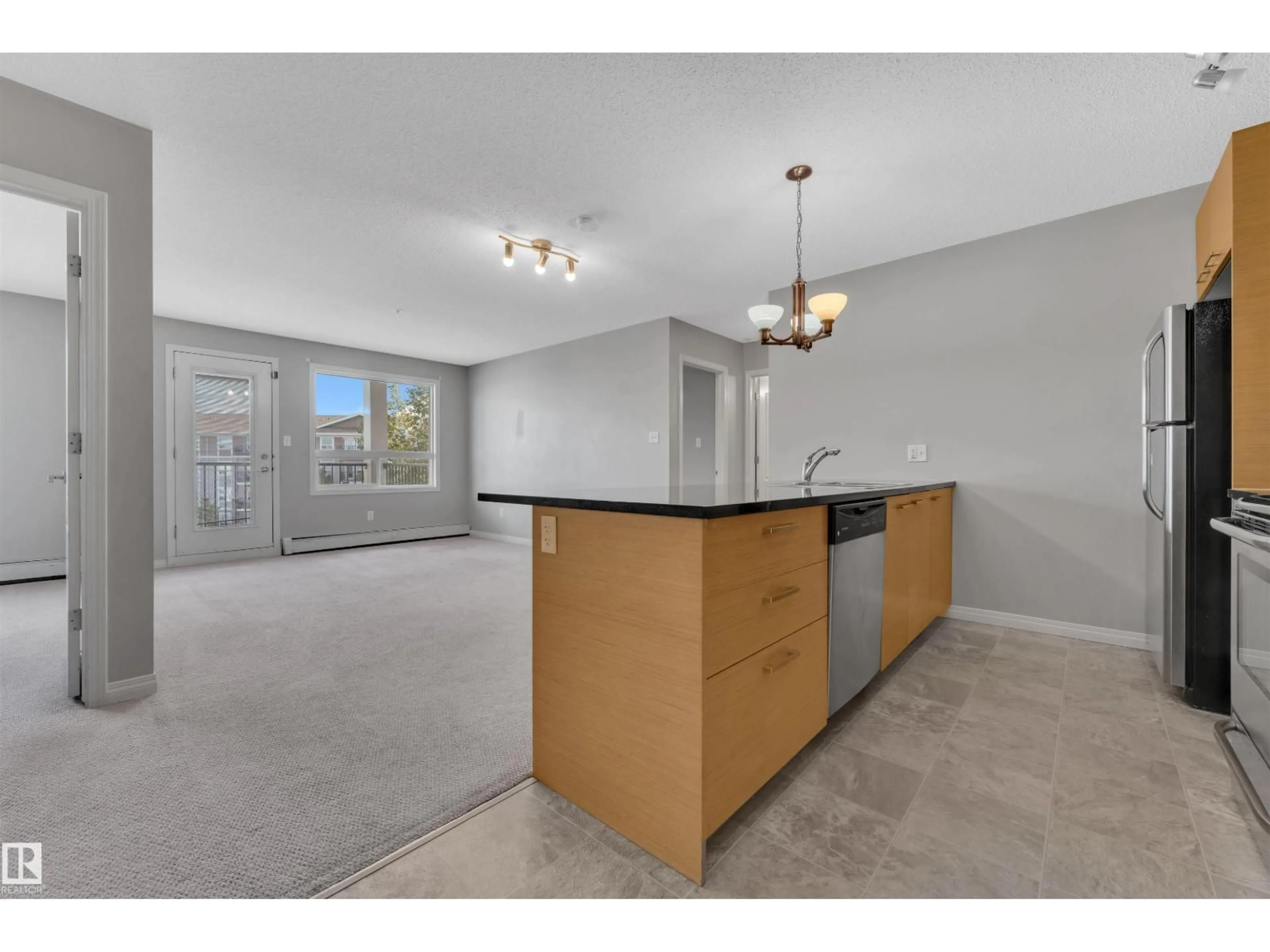 Open concept kitchen, unknown for #3302 - 9351 SIMPSON DR, Edmonton Alberta T6R0N3