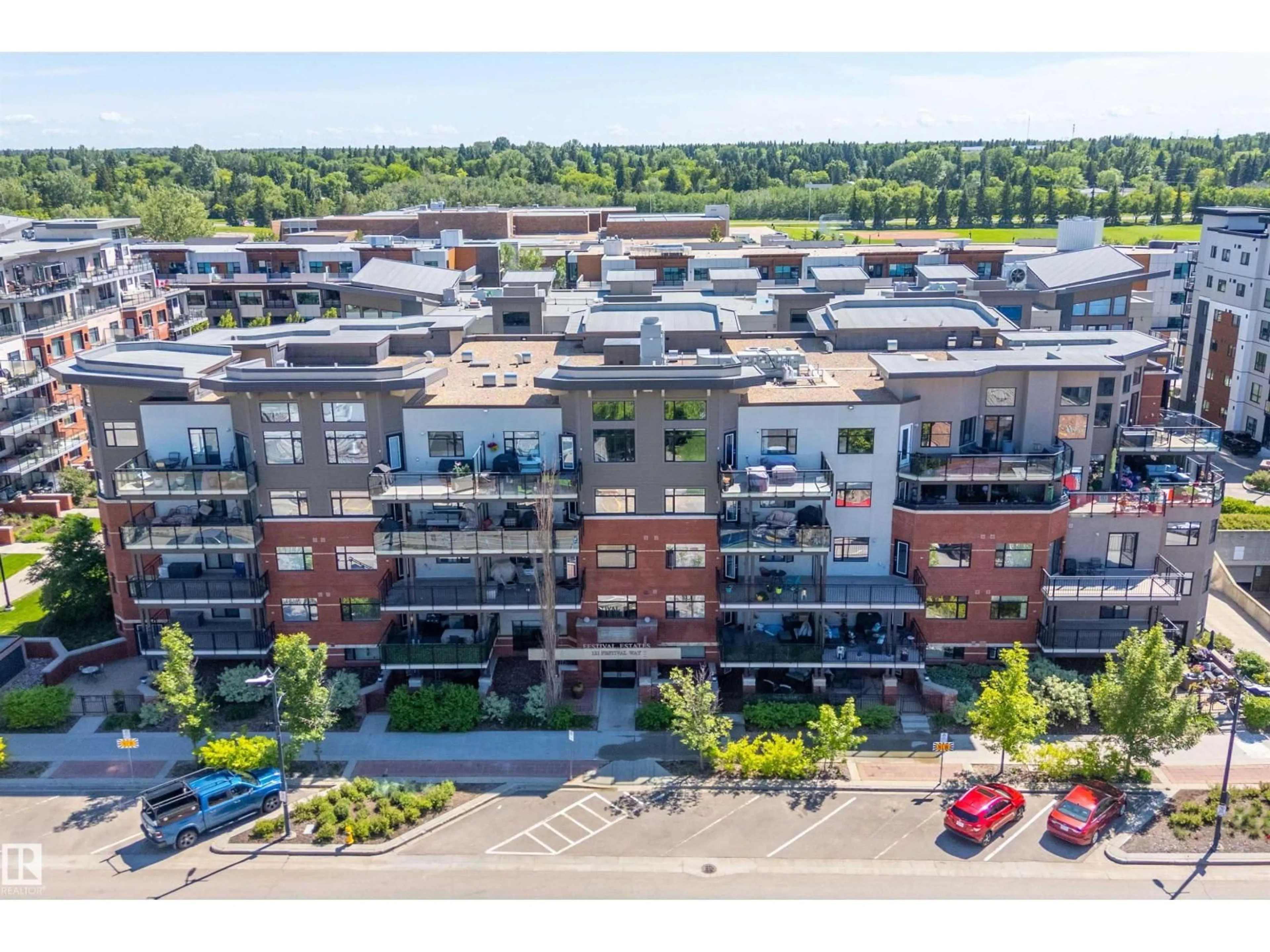 A pic from outside/outdoor area/front of a property/back of a property/a pic from drone, city buildings view from balcony for 204 - 121 FESTIVAL WY, Sherwood Park Alberta T8A3B4