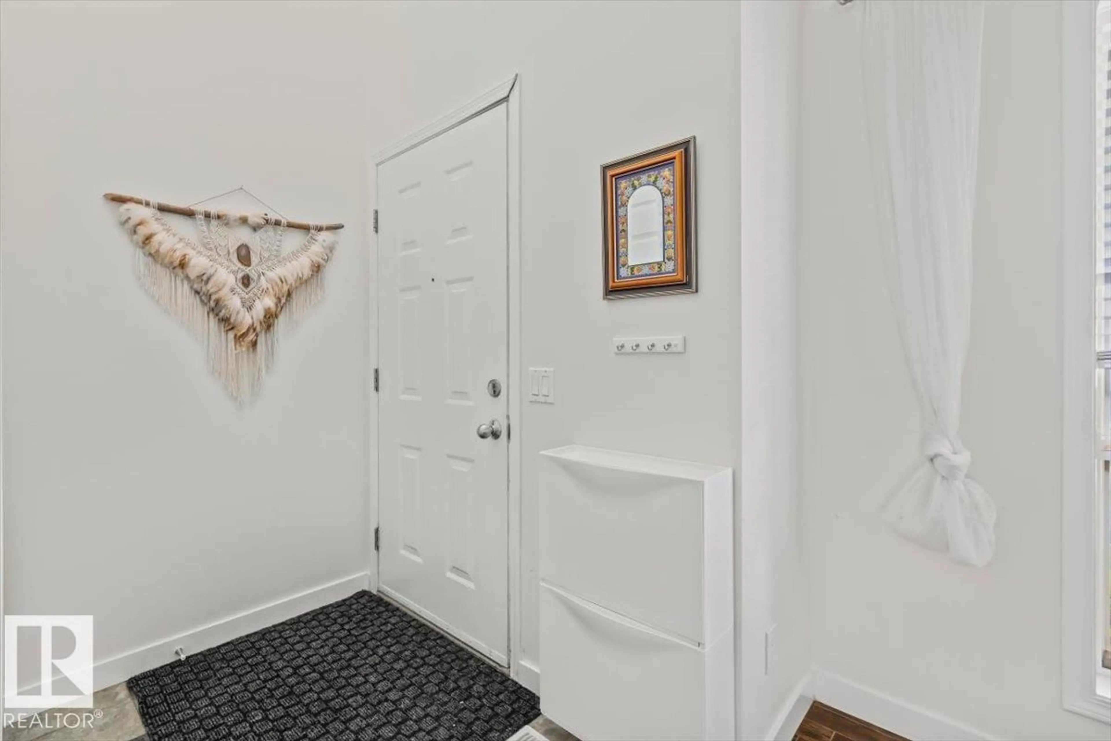 Indoor entryway for #111 - 10909 106 ST NW, Edmonton Alberta T5H4M7