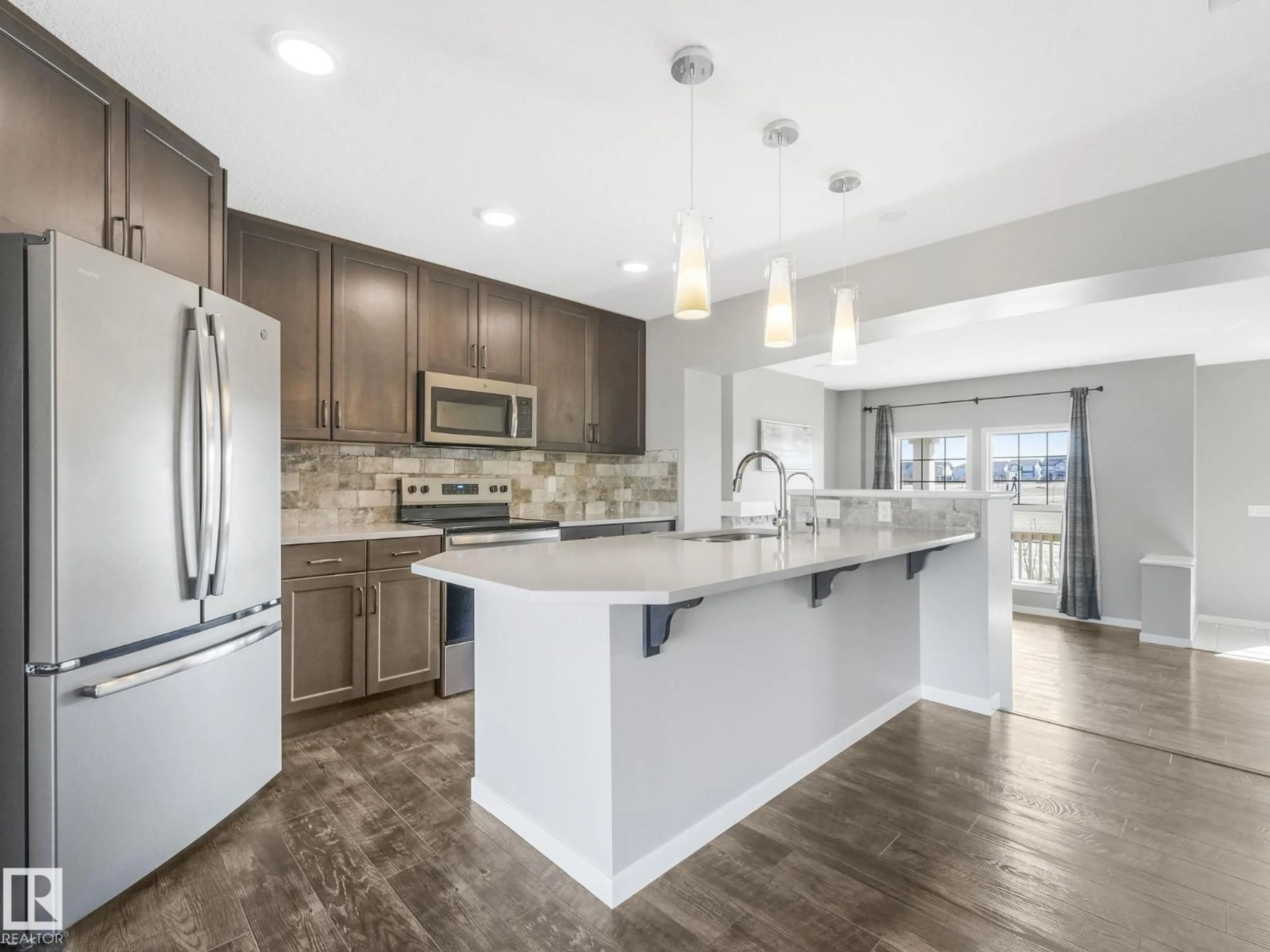 Open concept kitchen, ceramic/tile floor for 4108 CHAPPELLE GR, Edmonton Alberta T6W4M5