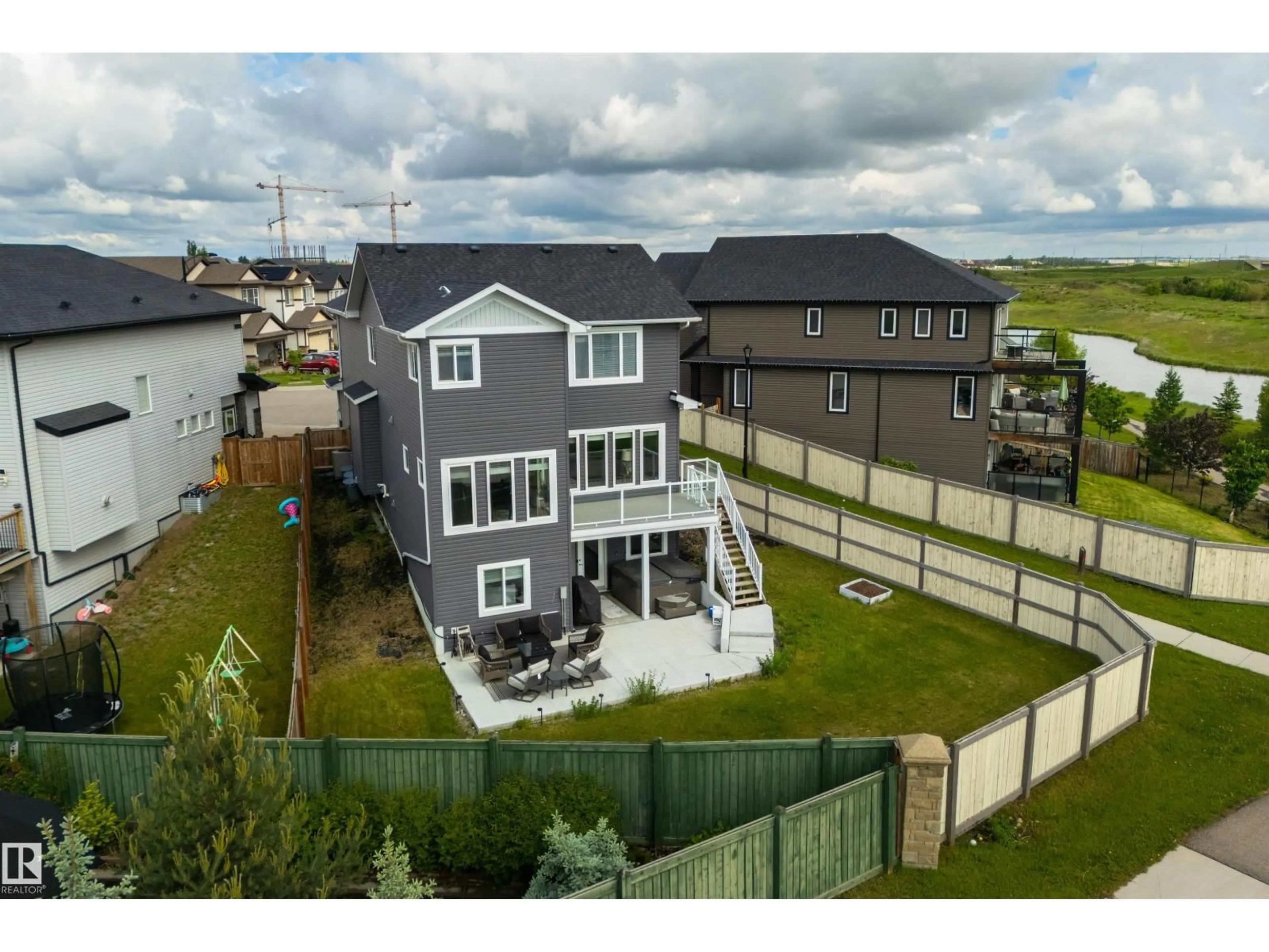 A pic from outside/outdoor area/front of a property/back of a property/a pic from drone, water/lake/river/ocean view for 20503 97 AV, Edmonton Alberta T5T4V7