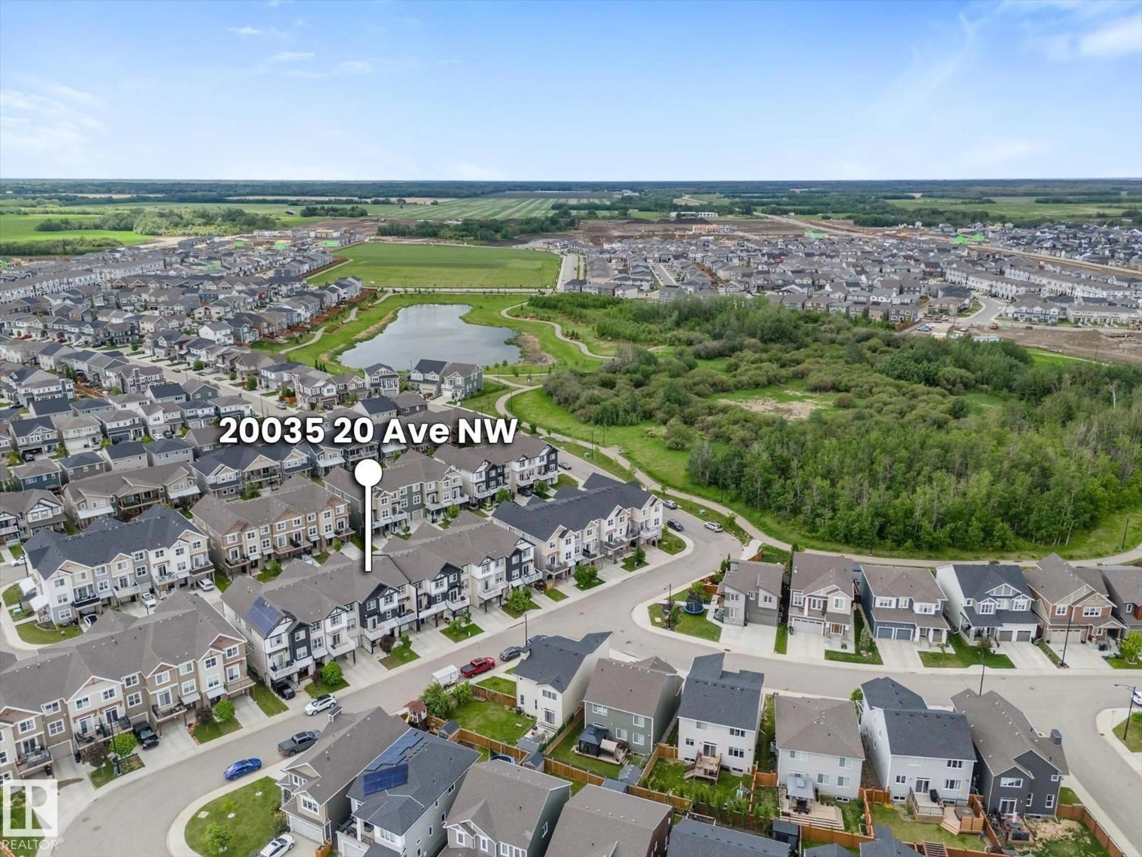 A pic from outside/outdoor area/front of a property/back of a property/a pic from drone, water/lake/river/ocean view for 20035 20 AV, Edmonton Alberta T6M0X7