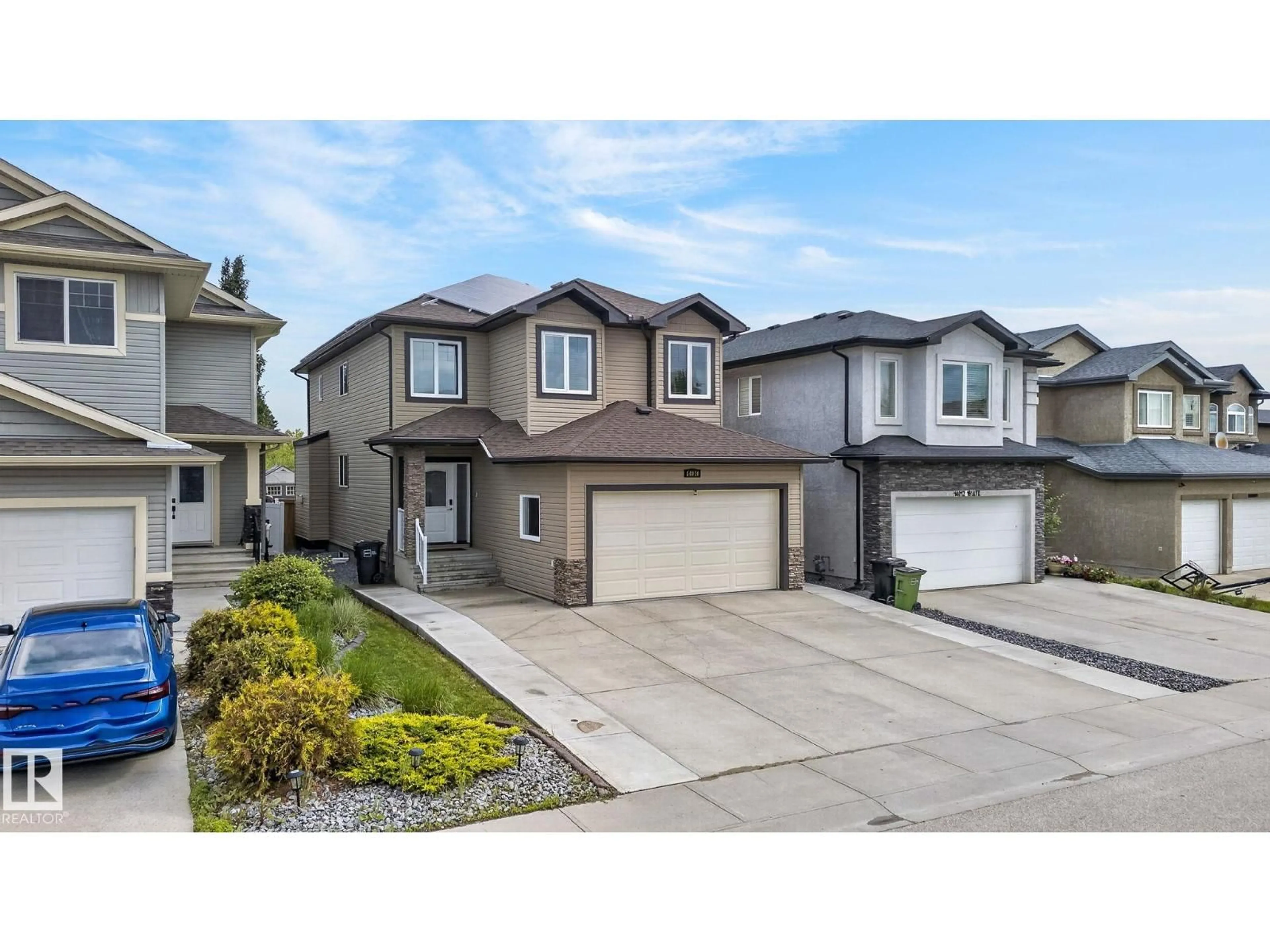 Home with vinyl exterior material, street for NW - 14016 161 AV, Edmonton Alberta T6V0E5