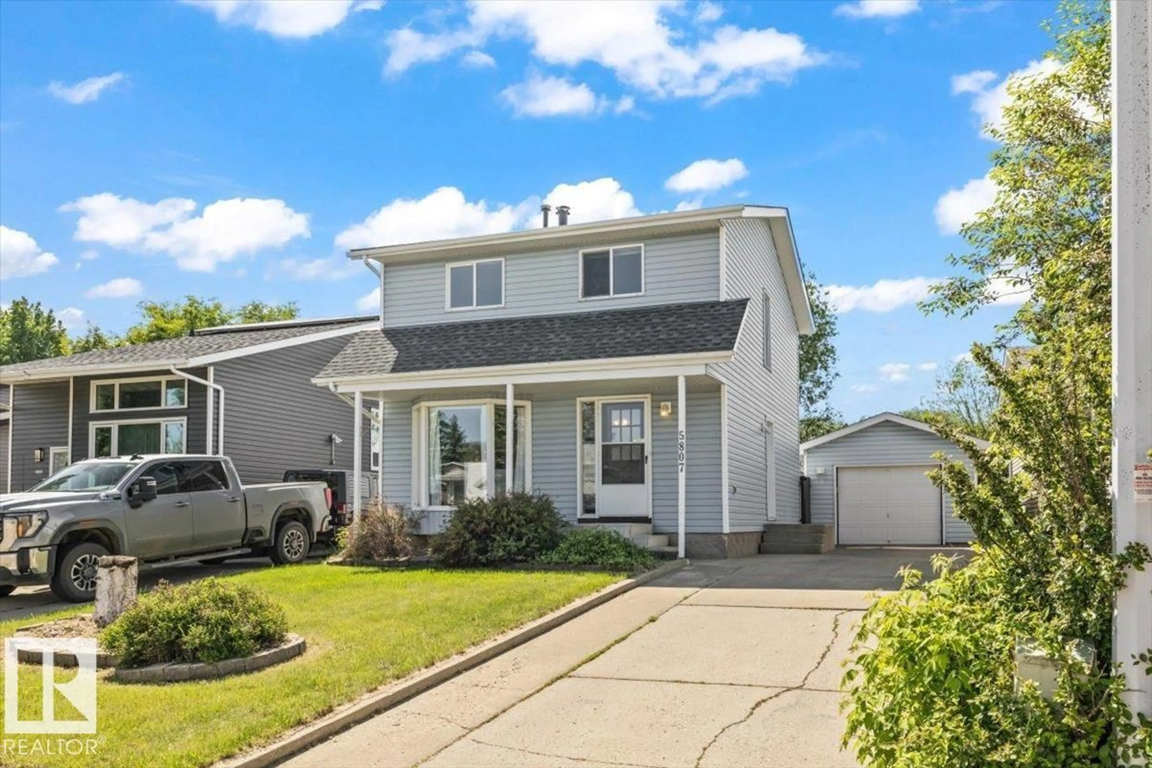 Home with vinyl exterior material, street for 5807 52 AV, Beaumont Alberta T4X1B5