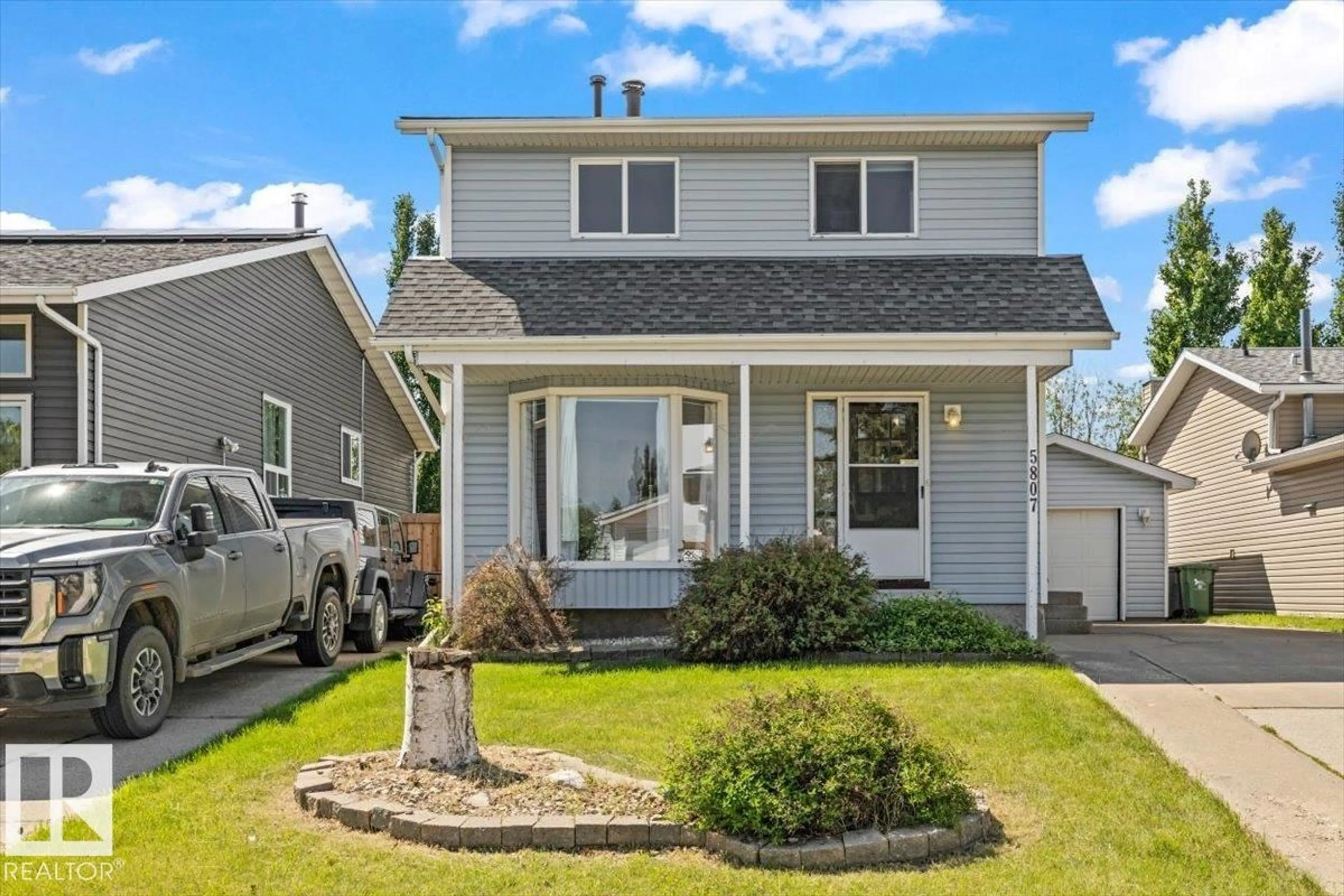 Home with vinyl exterior material, street for 5807 52 AV, Beaumont Alberta T4X1B5
