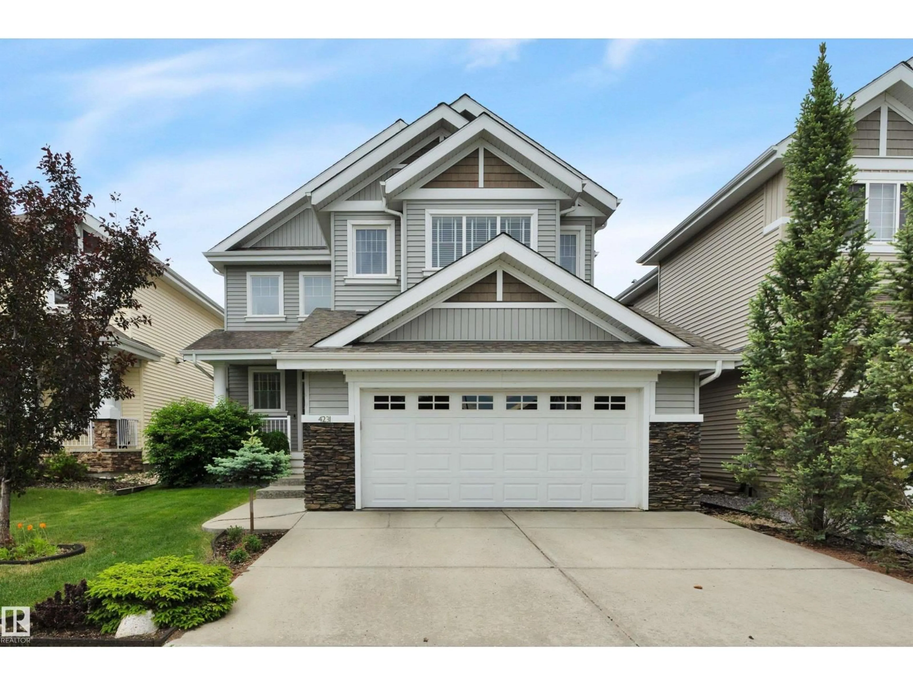 Home with vinyl exterior material, street for 4231 SAVARYN DR, Edmonton Alberta T0T0T0