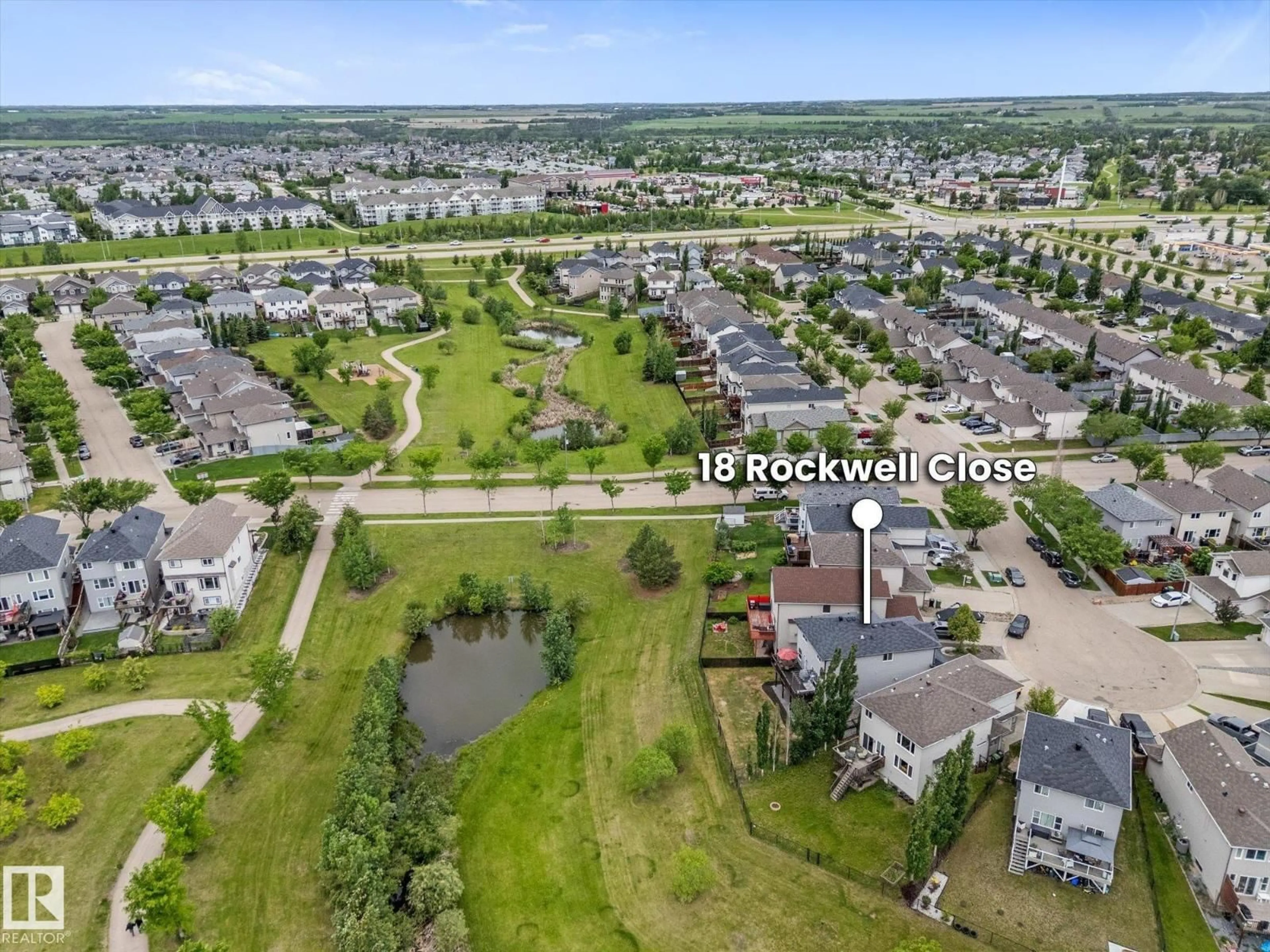 A pic from outside/outdoor area/front of a property/back of a property/a pic from drone, water/lake/river/ocean view for 18 ROCKWELL CL, Fort Saskatchewan Alberta T8L0E7