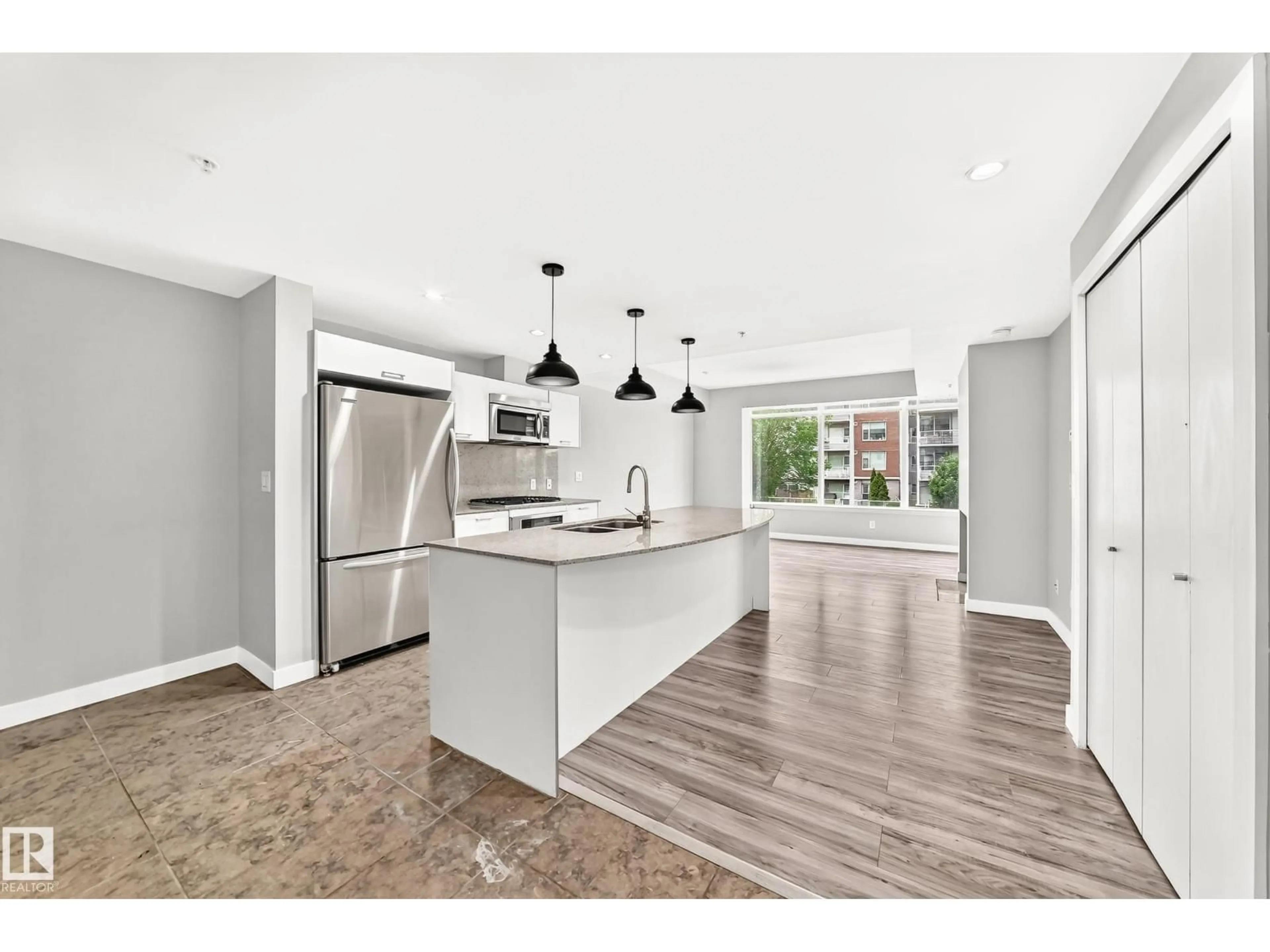 Open concept kitchen, unknown for 215 - 2510 109 ST NW, Edmonton Alberta T6J2X1