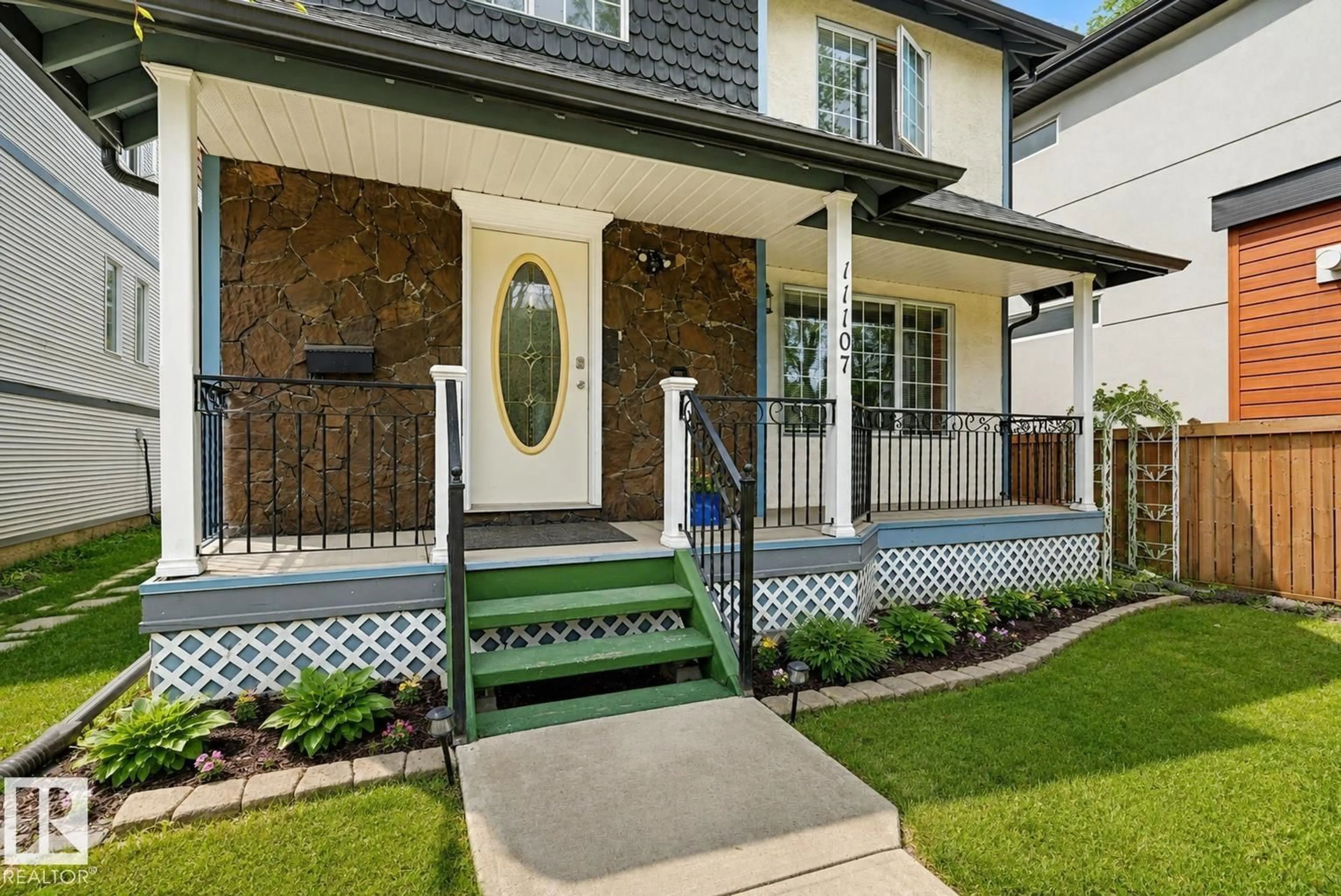 Home with vinyl exterior material, street for 11107 UNIVERSITY AV, Edmonton Alberta T6G1Y5