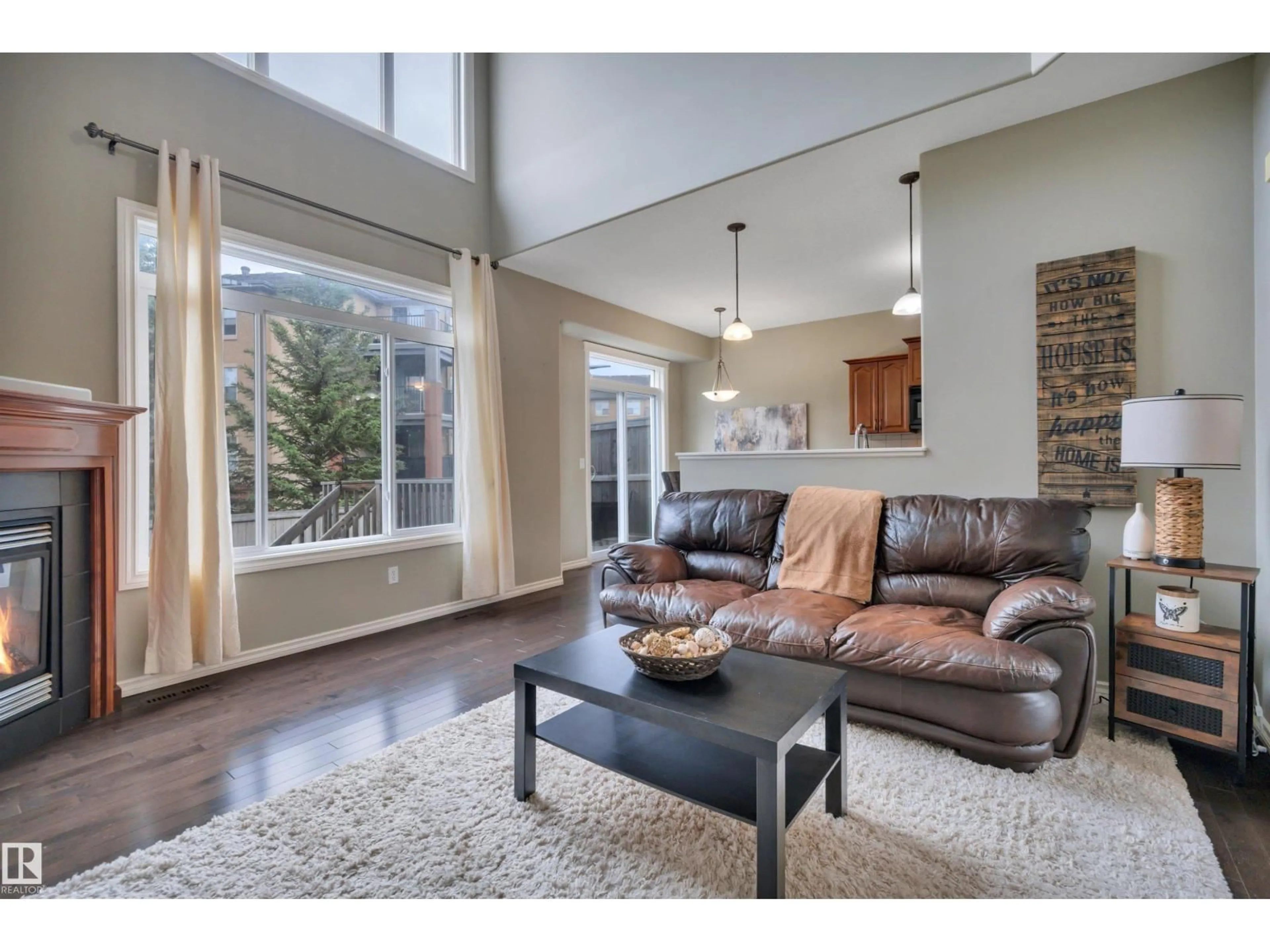 Living room with furniture, unknown for 11520 11 AV, Edmonton Alberta T6W1W7