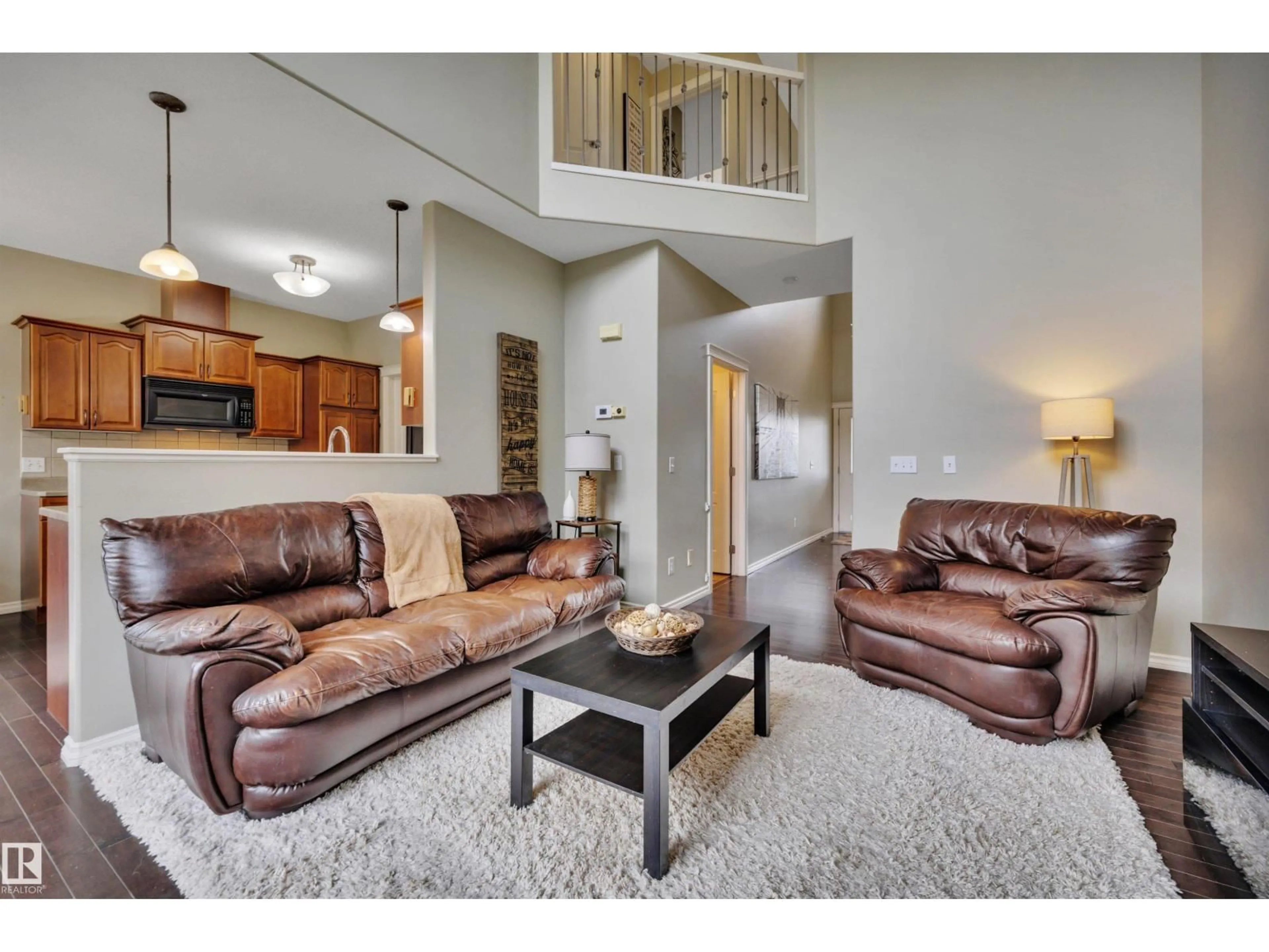 Living room with furniture, unknown for 11520 11 AV, Edmonton Alberta T6W1W7