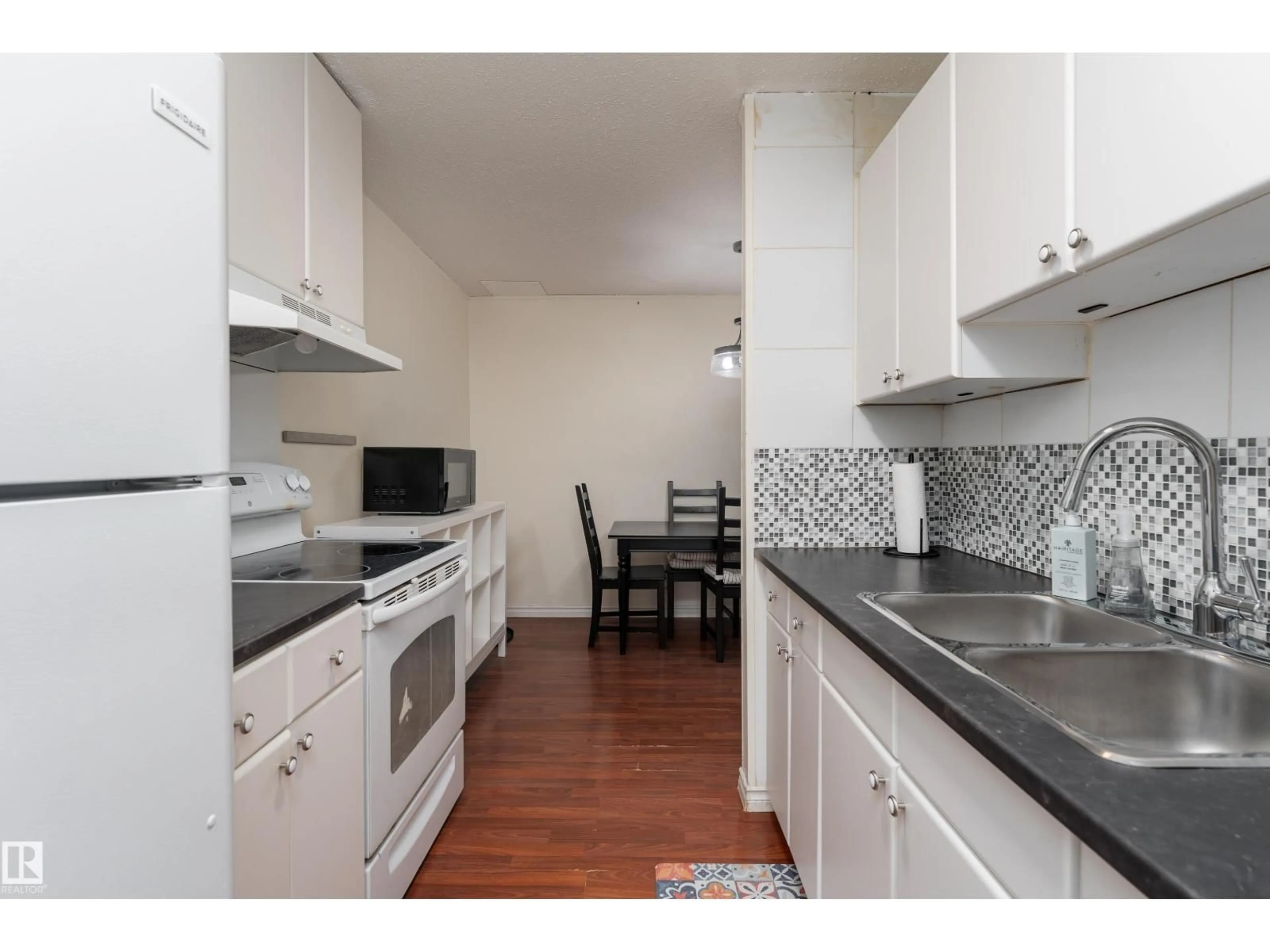 Standard kitchen, wood/laminate floor for 15217 54 ST, Edmonton Alberta T5A2N7