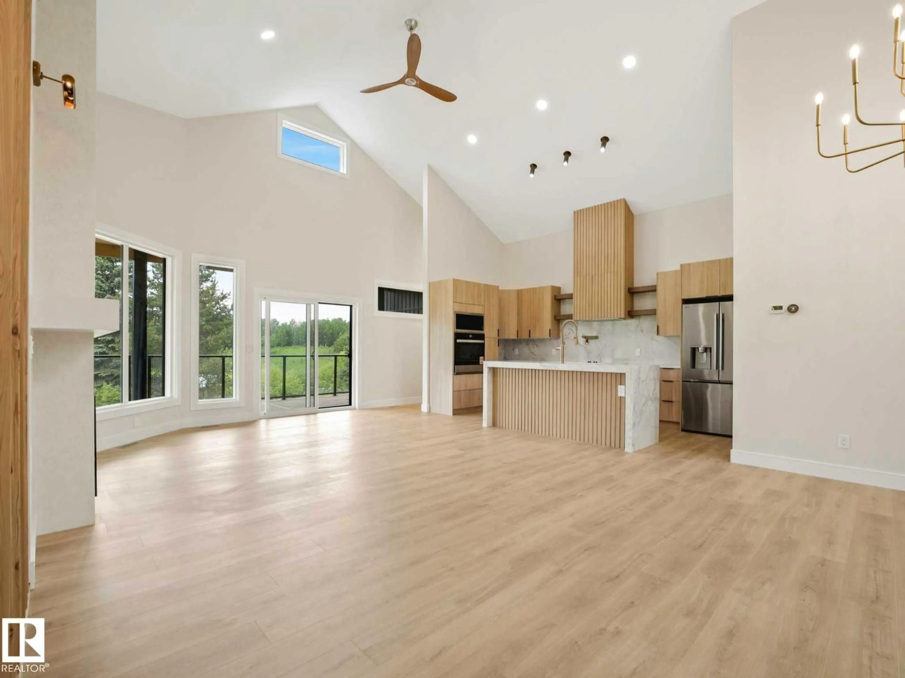 Open concept kitchen, wood/laminate floor for 53504 RGE ROAD 14, Rural Parkland County Alberta T7Y0B5