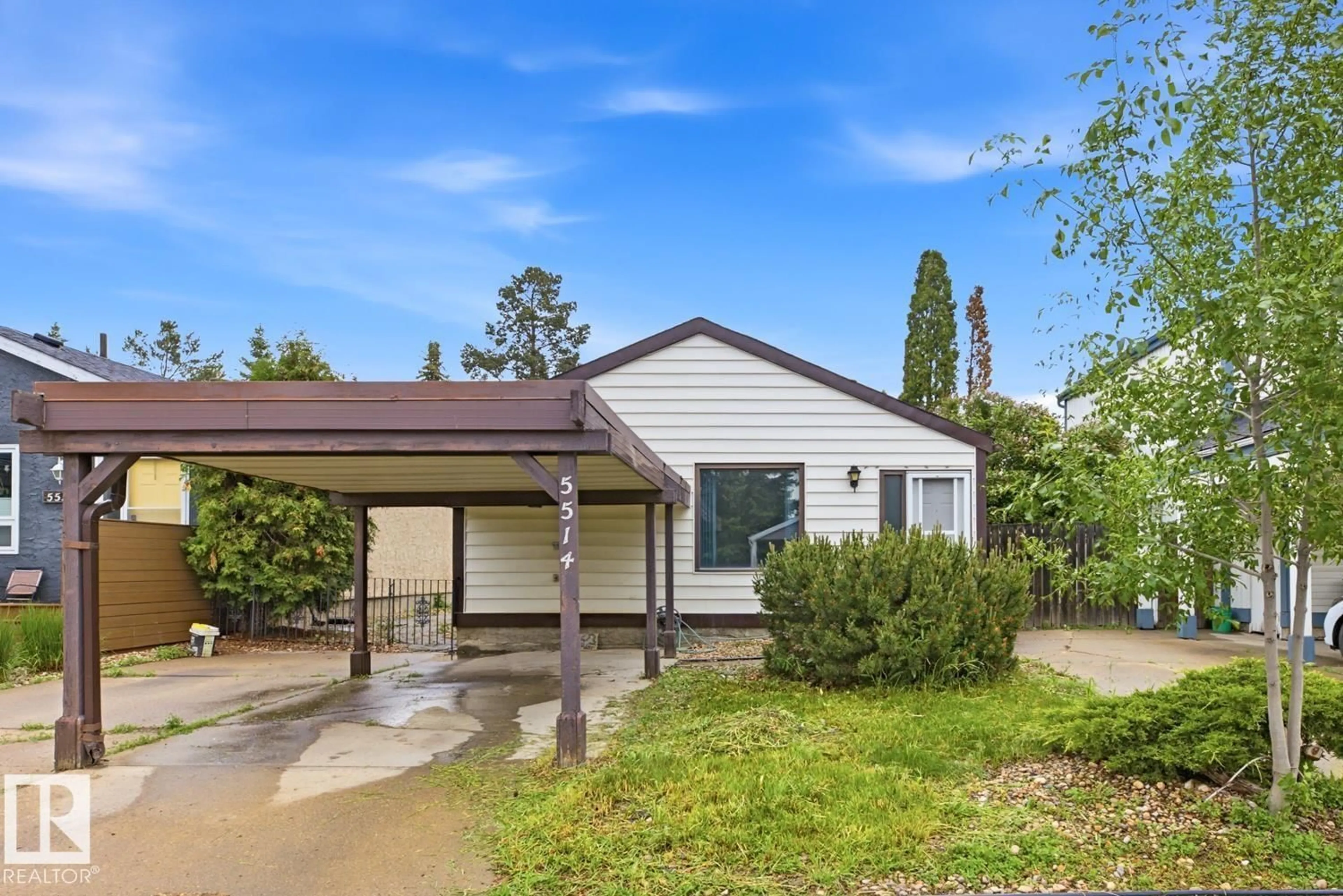Home with vinyl exterior material, street for 5514 93A AV, Edmonton Alberta T6B2K7