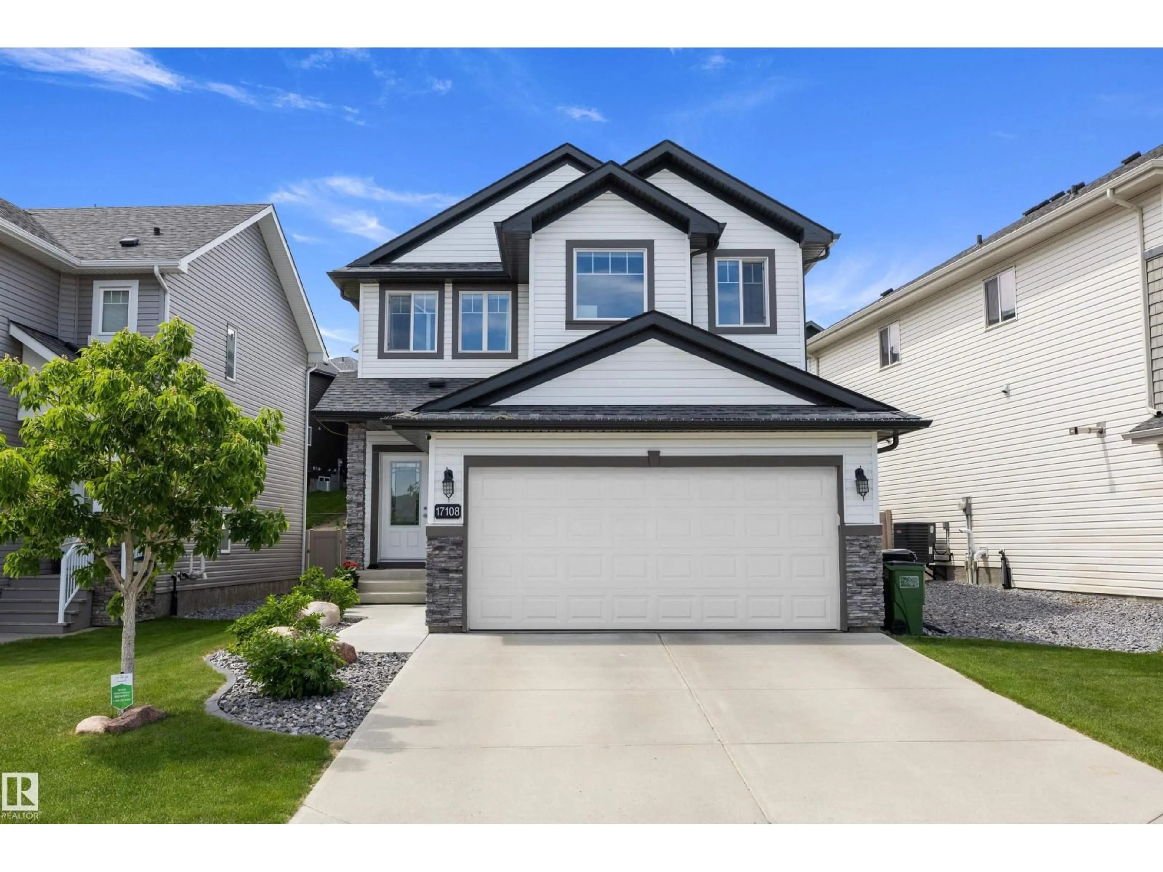 Home with vinyl exterior material, street for NW - 17108 43 ST, Edmonton Alberta T5Y0Z3