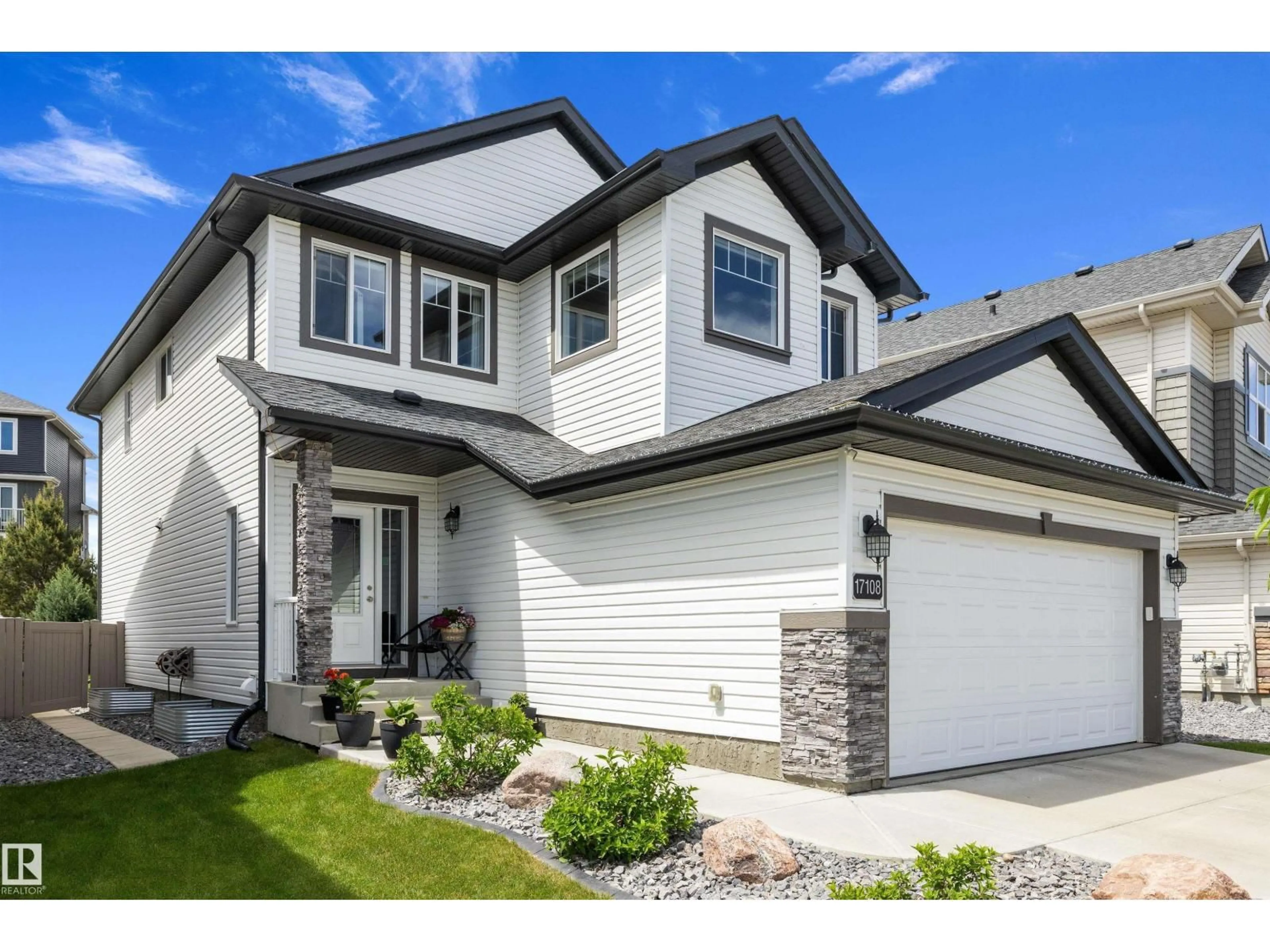 Home with vinyl exterior material, street for NW - 17108 43 ST, Edmonton Alberta T5Y0Z3