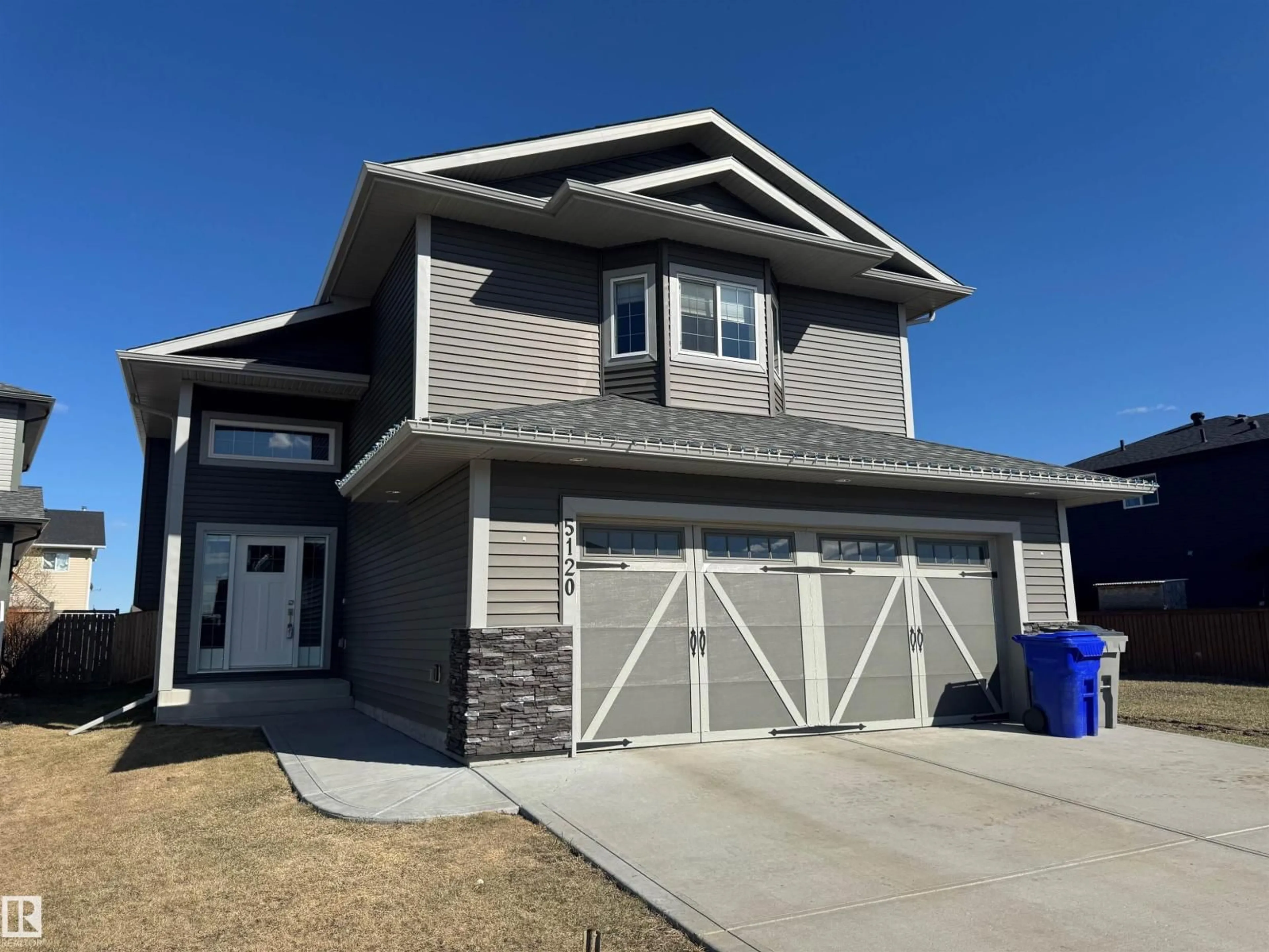 Home with vinyl exterior material, street for 5120 56 ST, Bruderheim Alberta T0B0S0