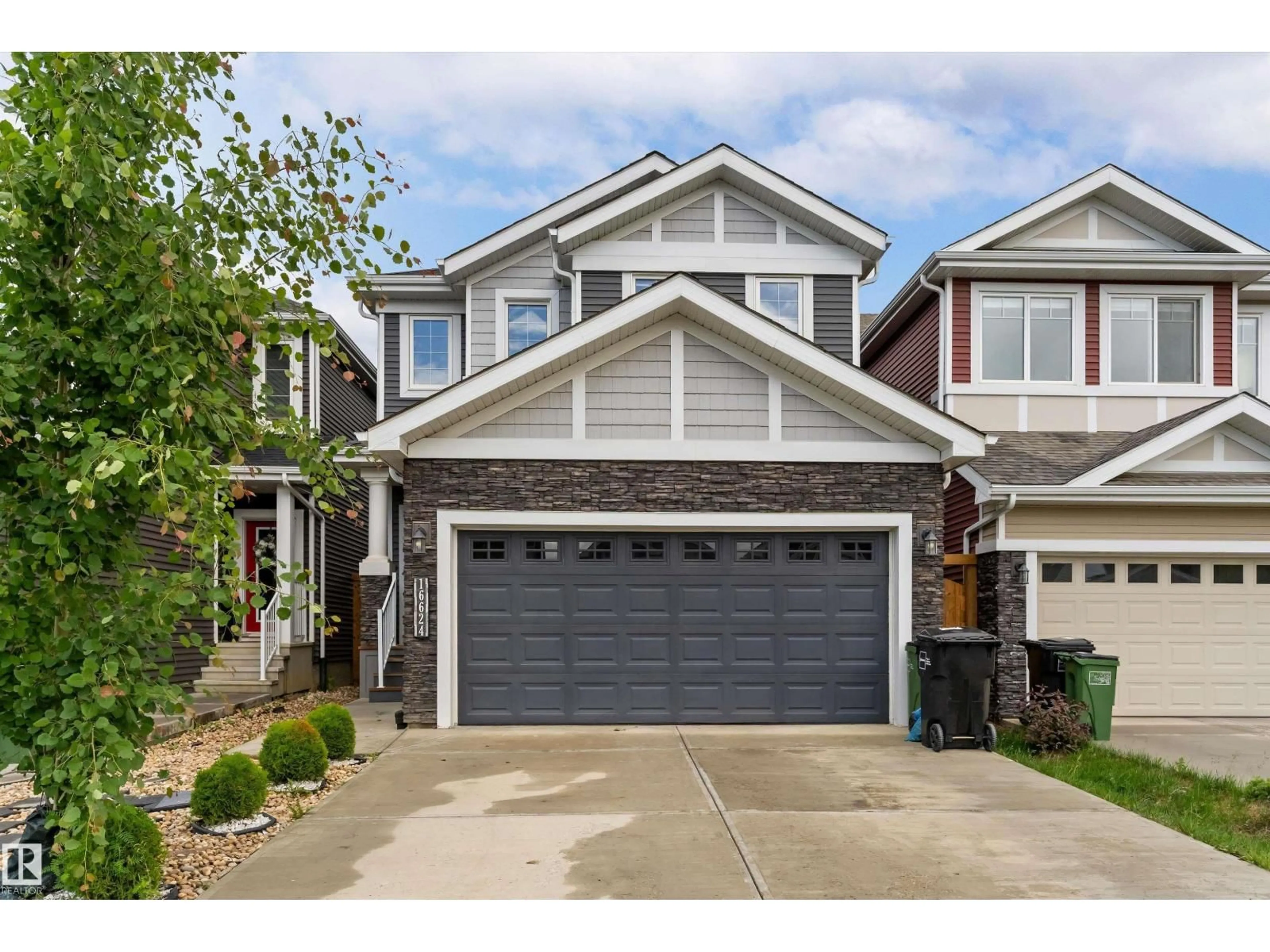 Home with vinyl exterior material, street for SW - 16624 32 AV, Edmonton Alberta T6W4R2