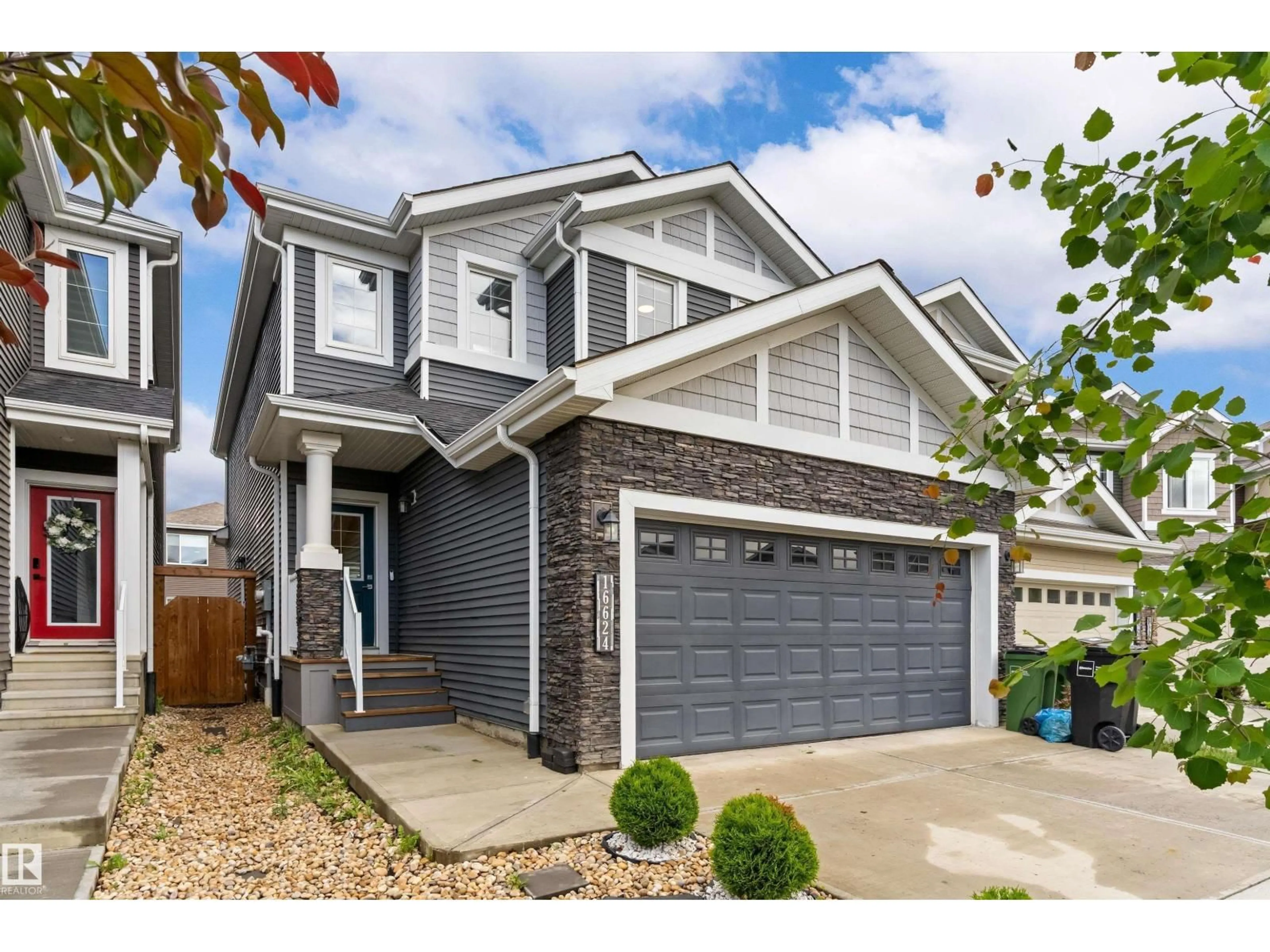Home with vinyl exterior material, street for SW - 16624 32 AV, Edmonton Alberta T6W4R2