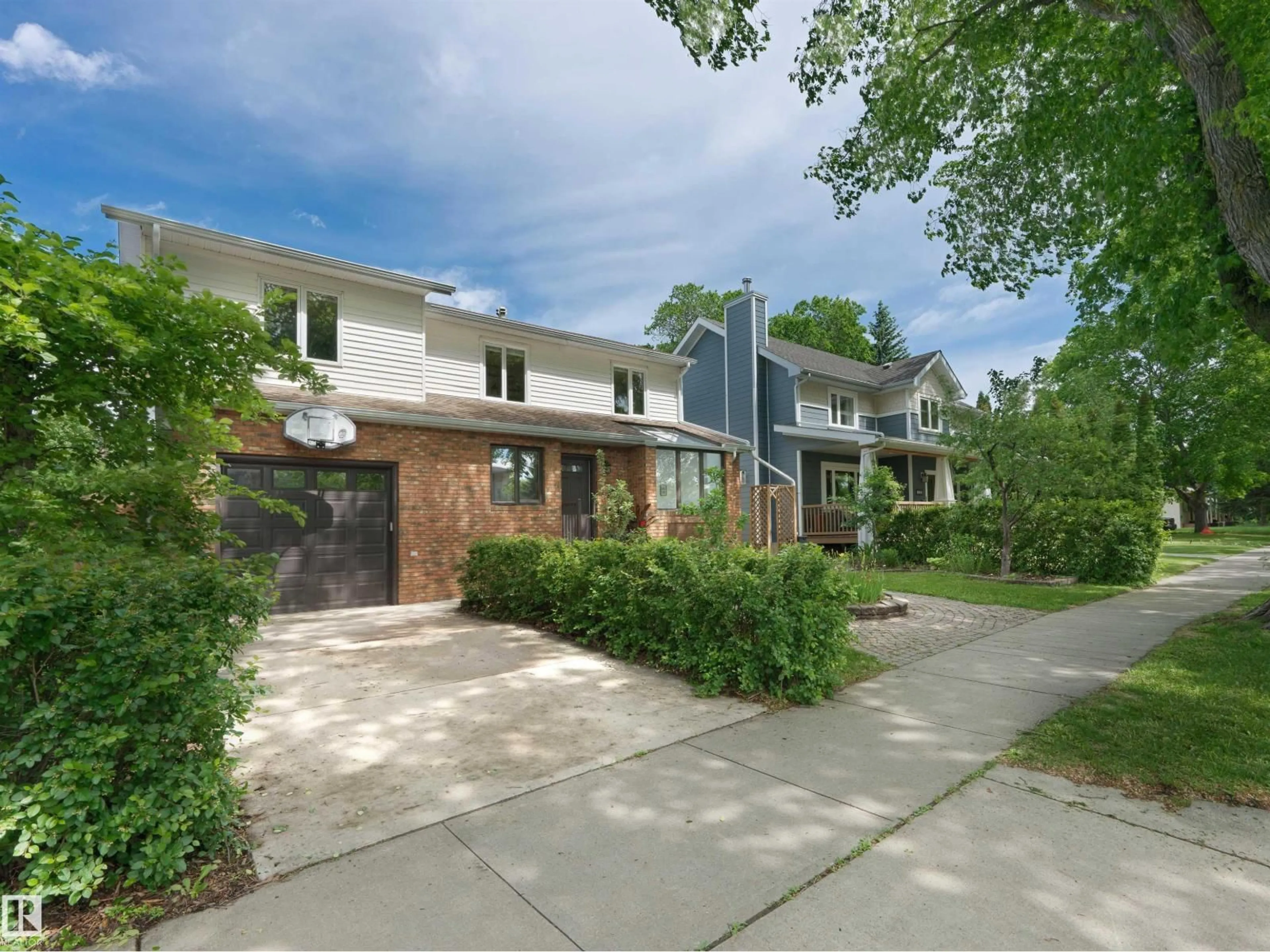 Home with brick exterior material, street for 7624 92 AV, Edmonton Alberta T6C1R4