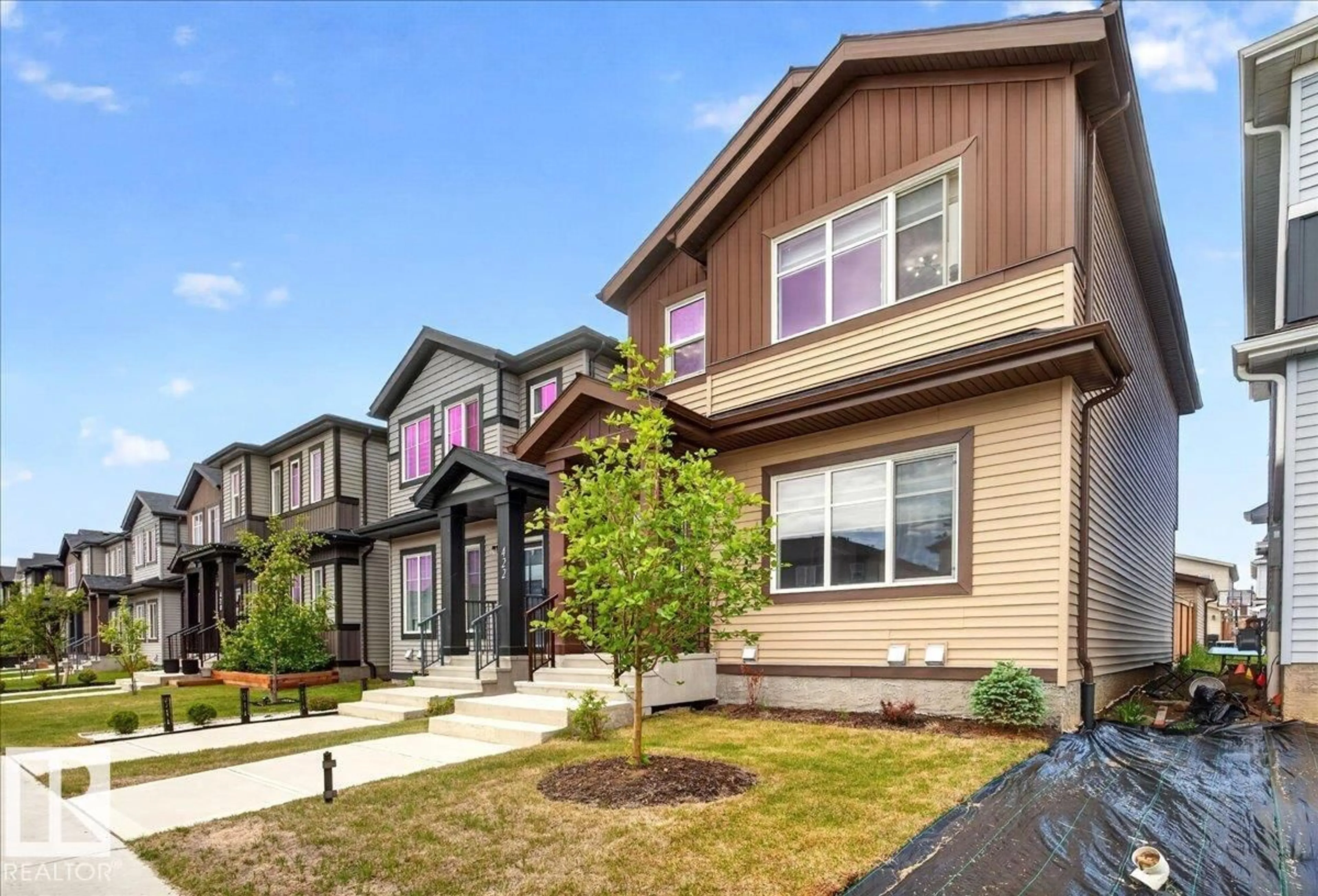 Home with vinyl exterior material, street for 424 BLACK STONE LI, Leduc Alberta T9E1L8