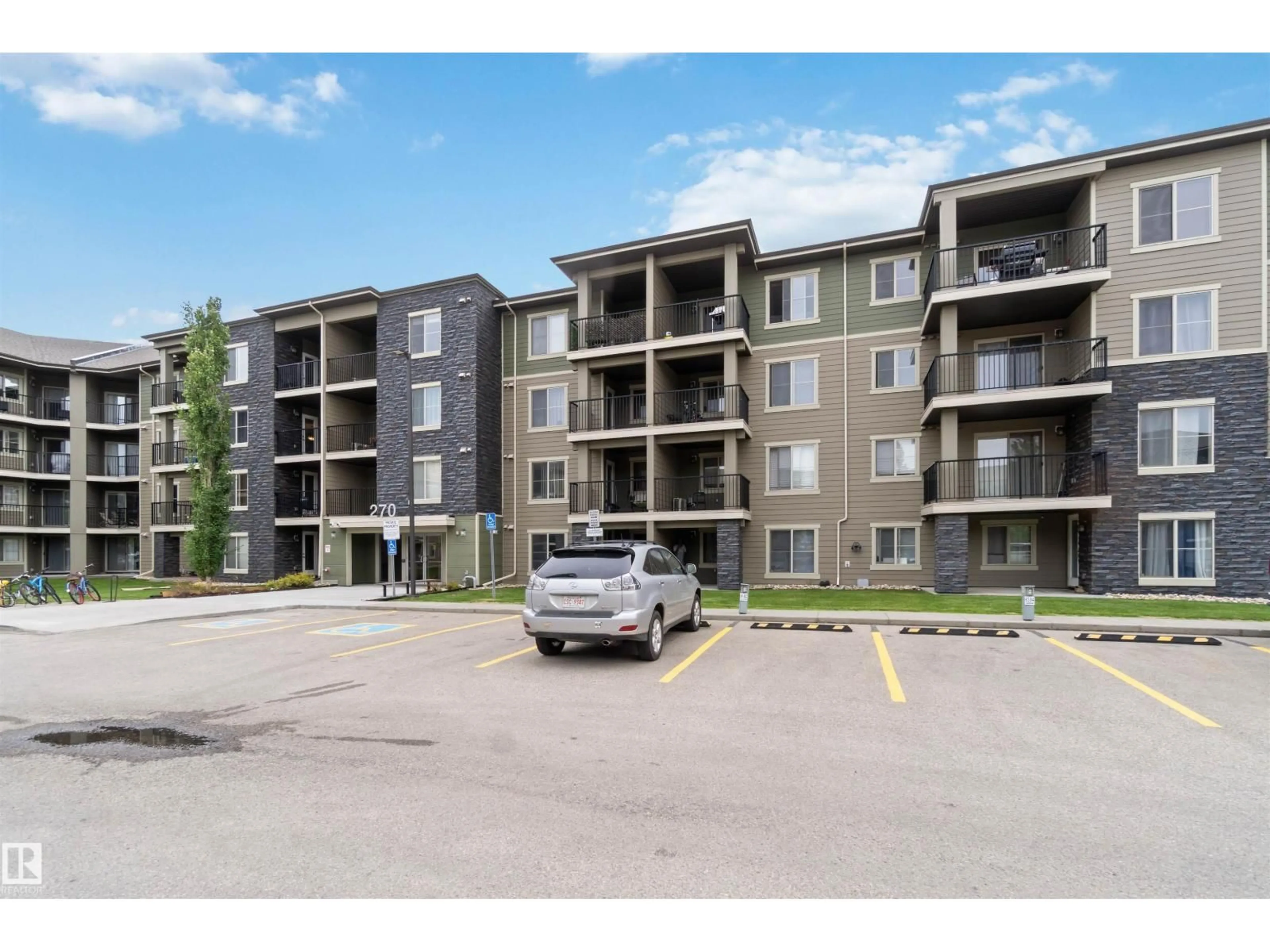 A pic from outside/outdoor area/front of a property/back of a property/a pic from drone, unknown for #403 - 270 MCCONACHIE DR, Edmonton Alberta T5Z0L2