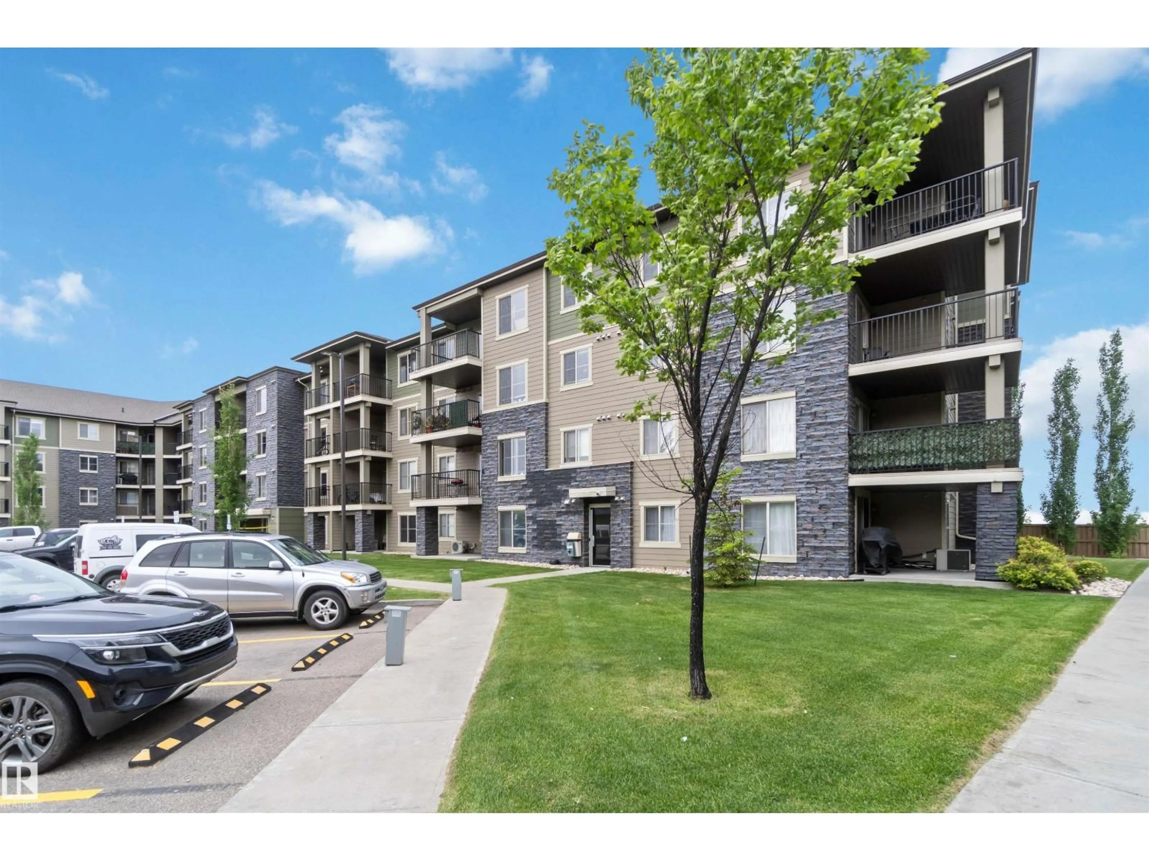 A pic from outside/outdoor area/front of a property/back of a property/a pic from drone, unknown for #403 - 270 MCCONACHIE DR, Edmonton Alberta T5Z0L2