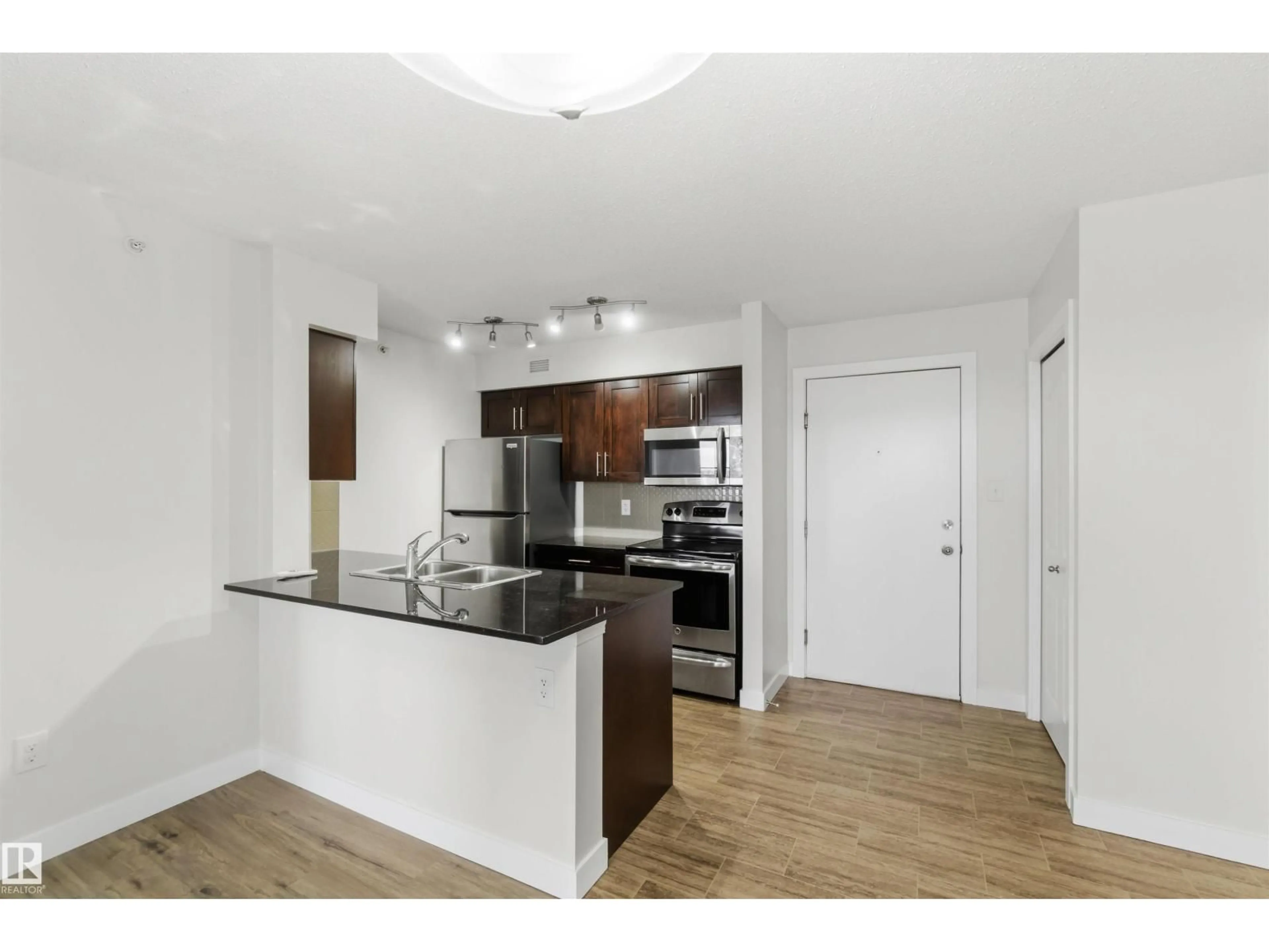 Standard kitchen, wood/laminate floor for #403 - 270 MCCONACHIE DR, Edmonton Alberta T5Z0L2
