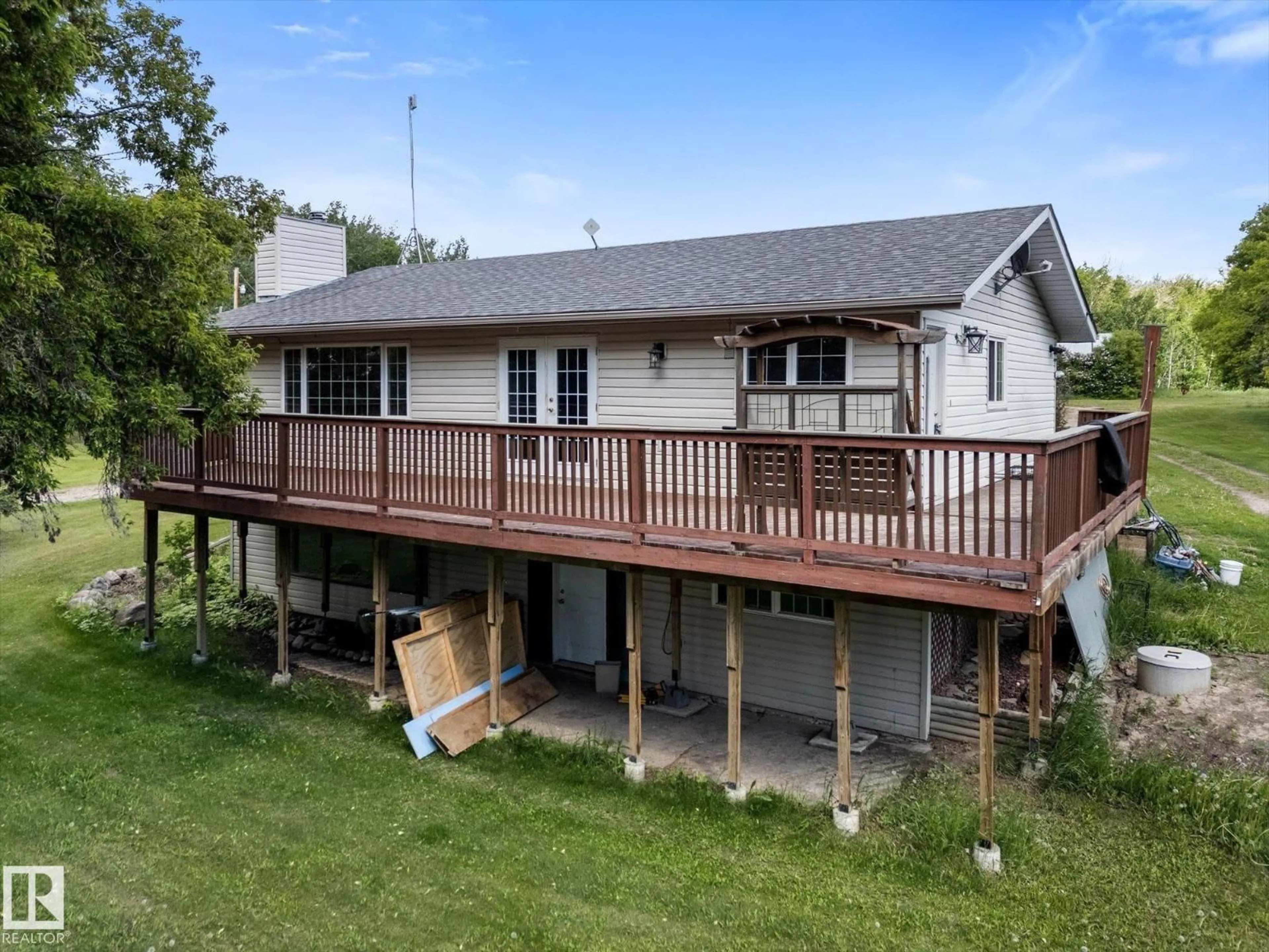 A pic from outside/outdoor area/front of a property/back of a property/a pic from drone, unknown for 51065 HWY 770, Rural Leduc County Alberta T0C2T0