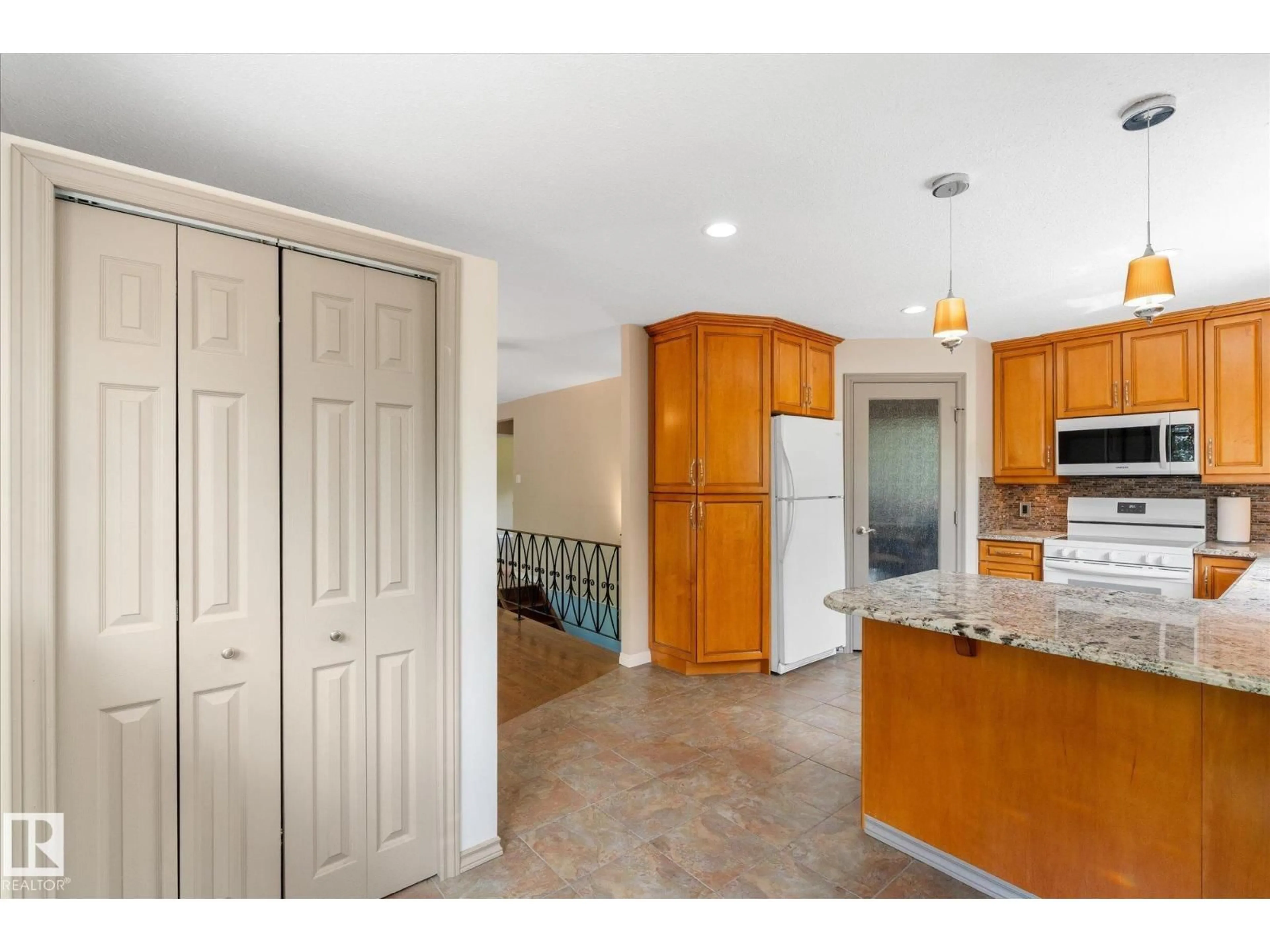 Open concept kitchen, ceramic/tile floor for 51065 HWY 770, Rural Leduc County Alberta T0C2T0