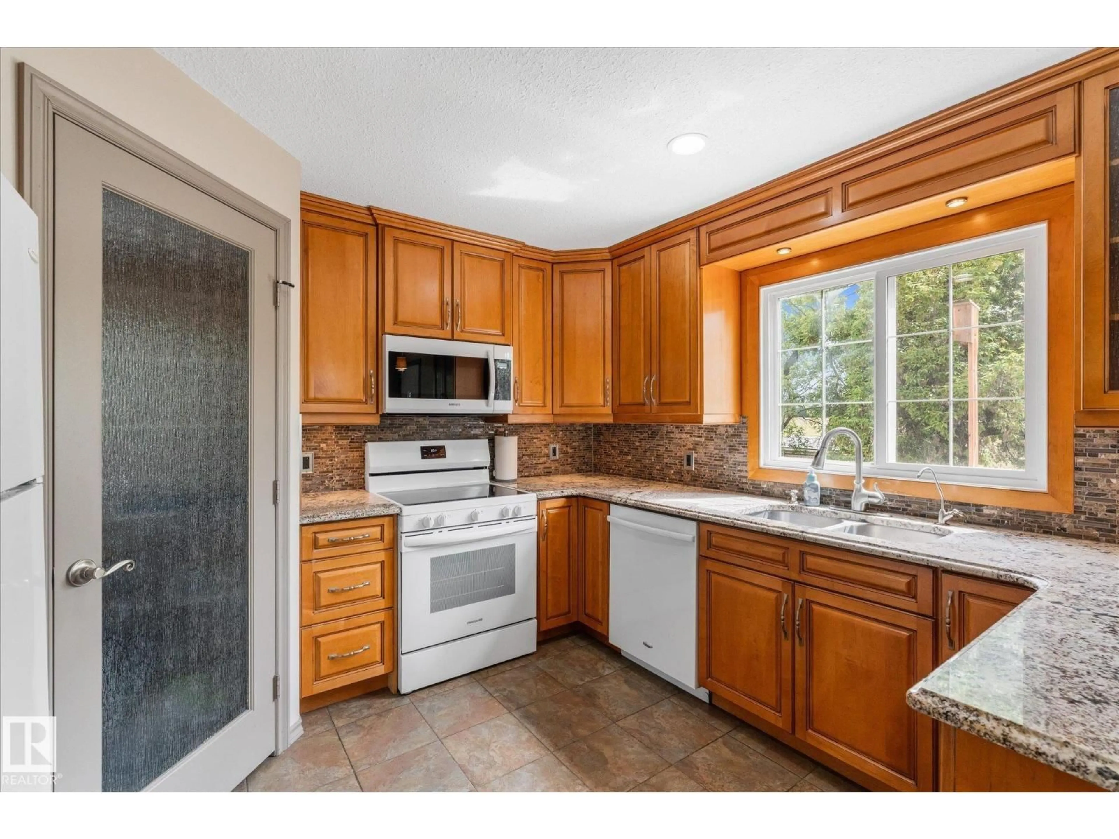 Standard kitchen, ceramic/tile floor for 51065 HWY 770, Rural Leduc County Alberta T0C2T0