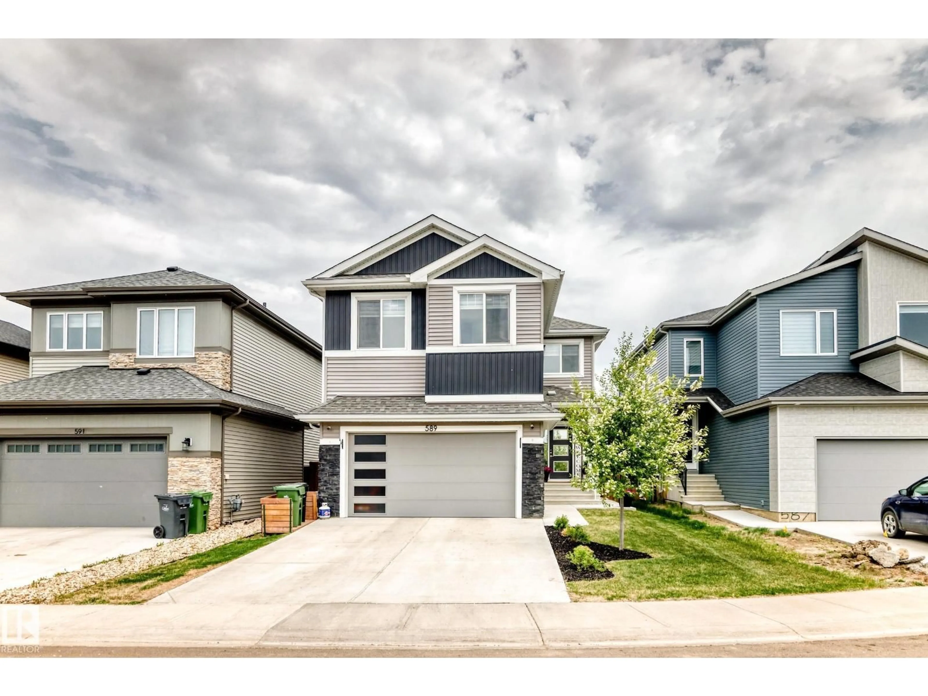 Home with vinyl exterior material, street for 589 BOULDER WD, Leduc Alberta T9E1M1