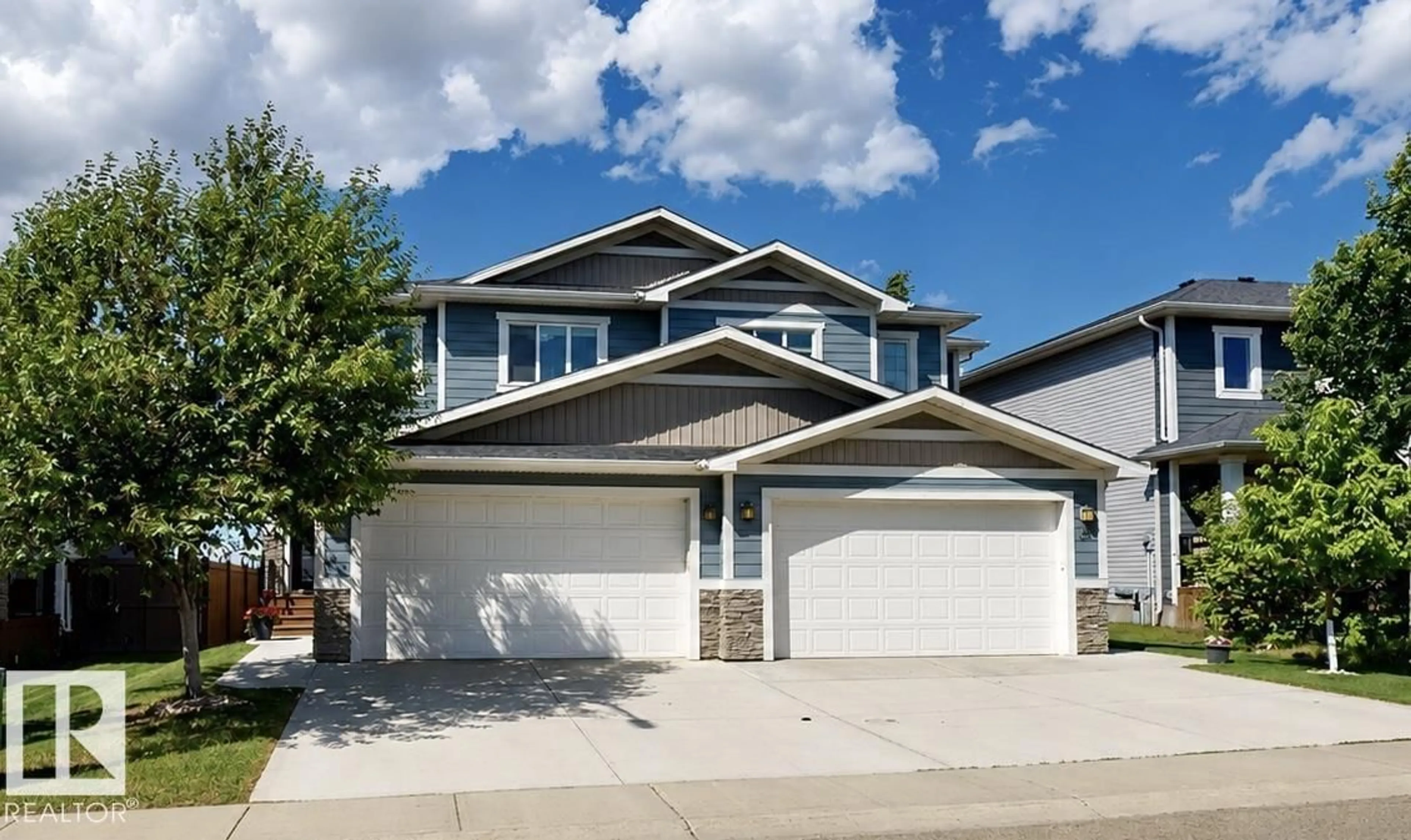 Home with vinyl exterior material, street for 70 HAZELWOOD LN, Spruce Grove Alberta T7X0R7
