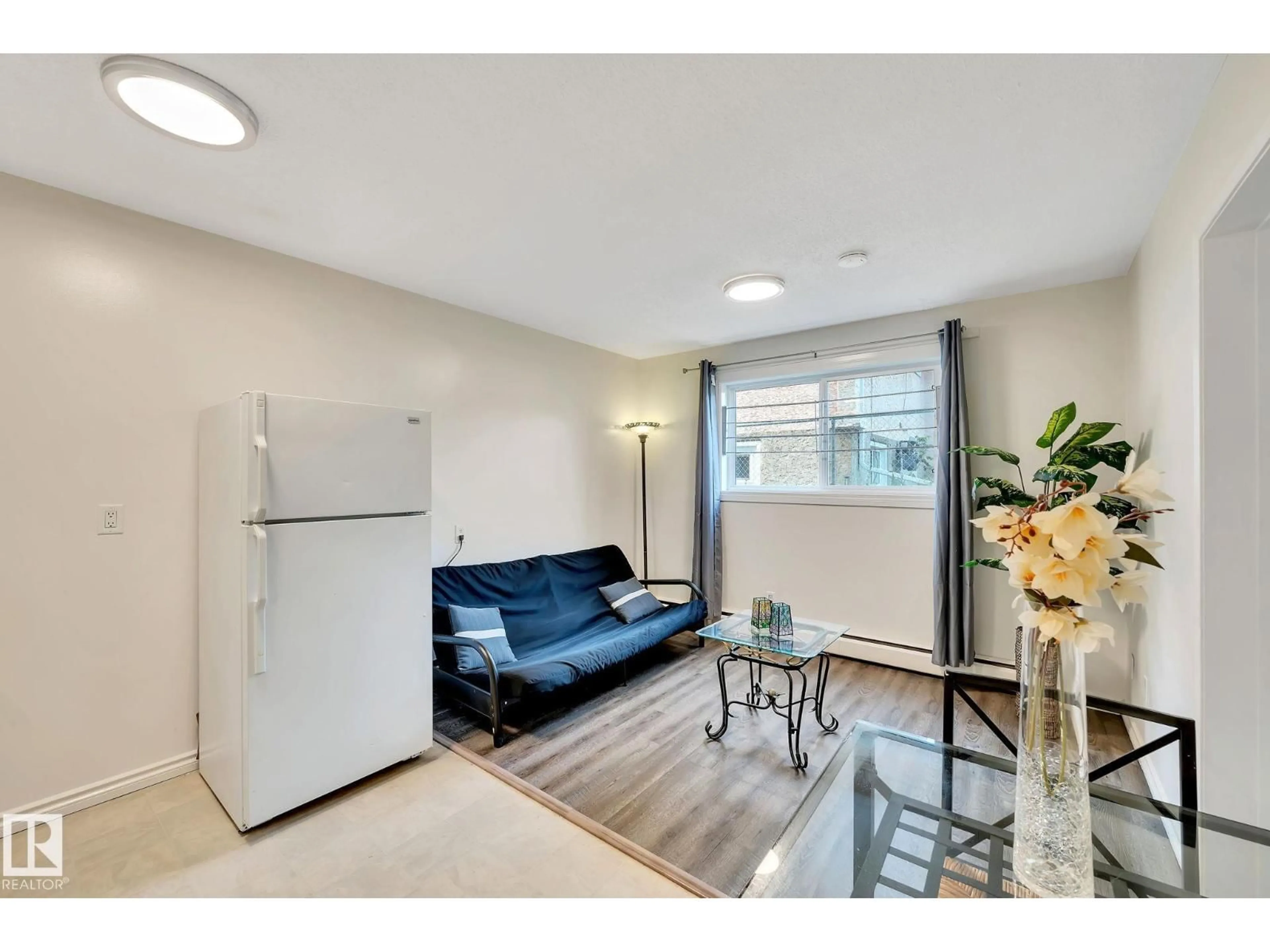 Living room with furniture, unknown for #104 - 12409 82 ST, Edmonton Alberta T5B2X5