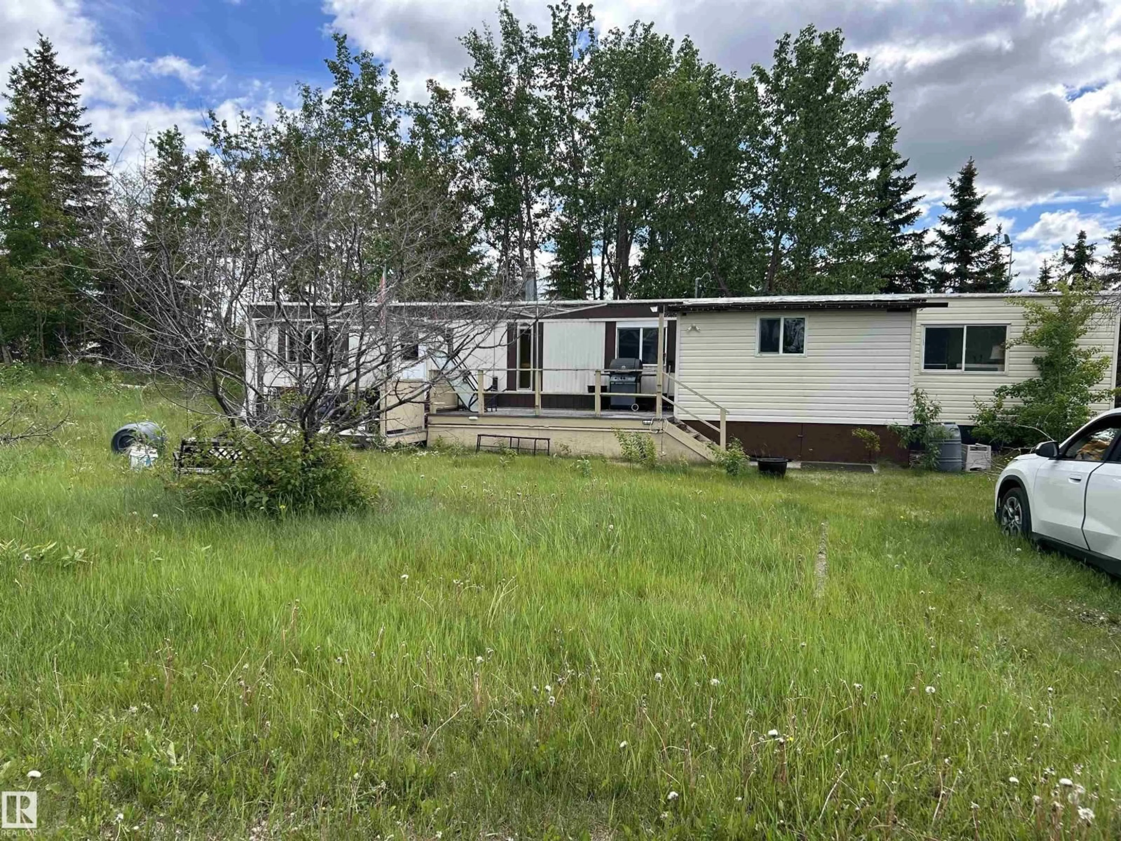 A pic from outside/outdoor area/front of a property/back of a property/a pic from drone, unknown for 45 23319 TWP ROAD 572, Rural Sturgeon County Alberta T0A1N5