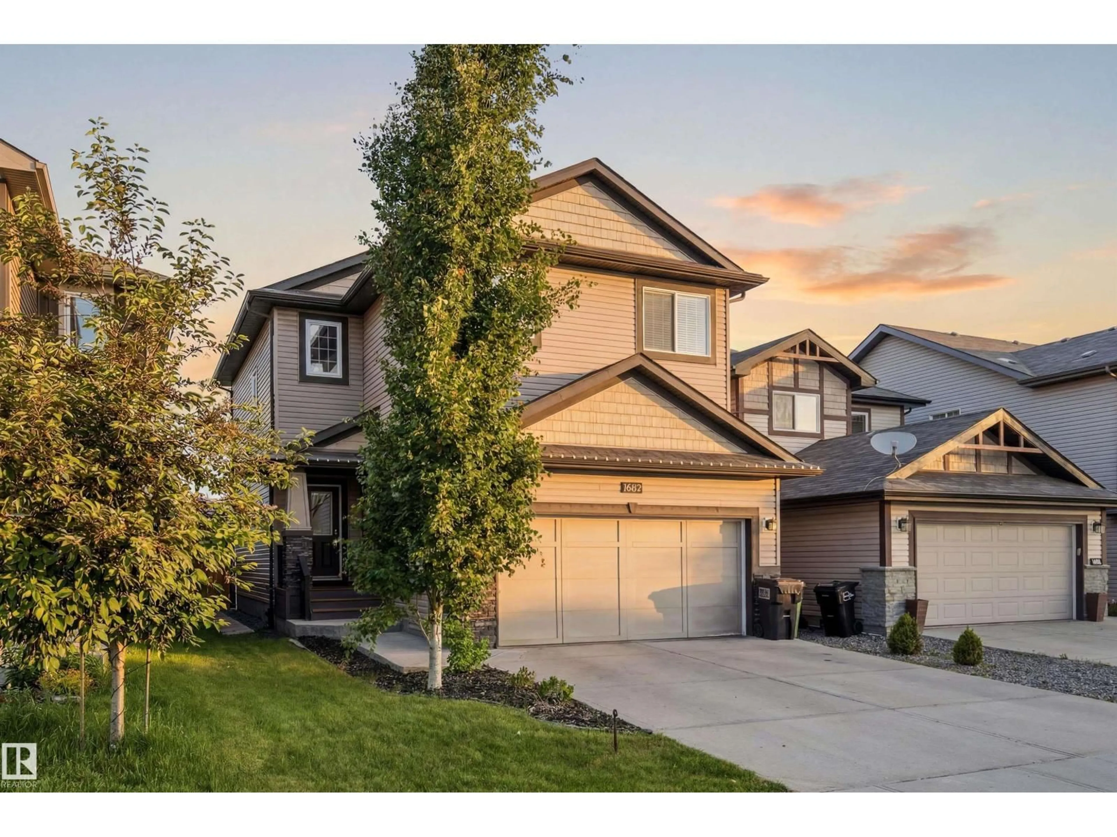 Home with vinyl exterior material, street for SW - 16412 12 AV, Edmonton Alberta T6W3K4