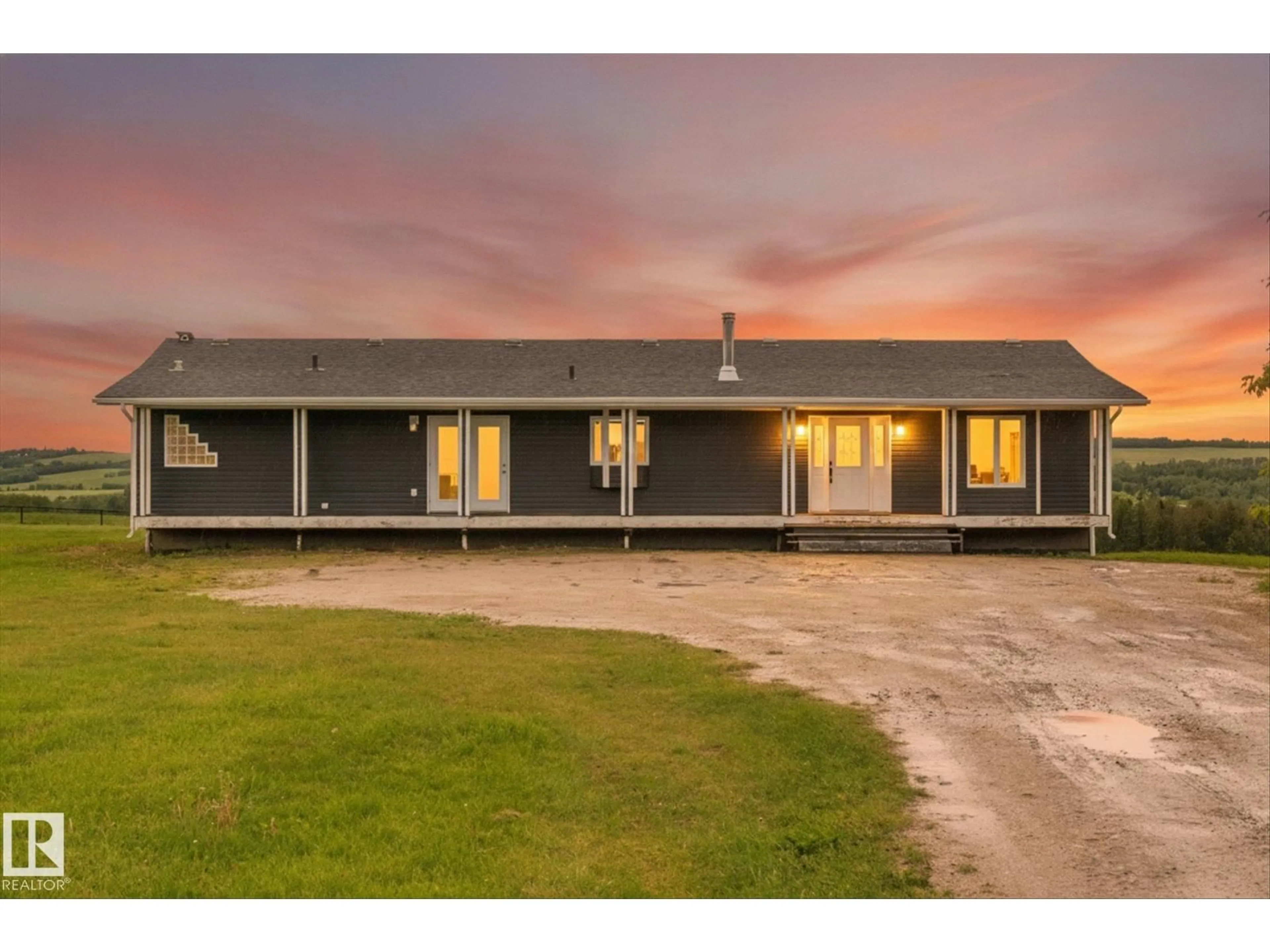 A pic from outside/outdoor area/front of a property/back of a property/a pic from drone, building for 8223 TWP ROAD 590, Rural Lac Ste. Anne County Alberta T0E1N0